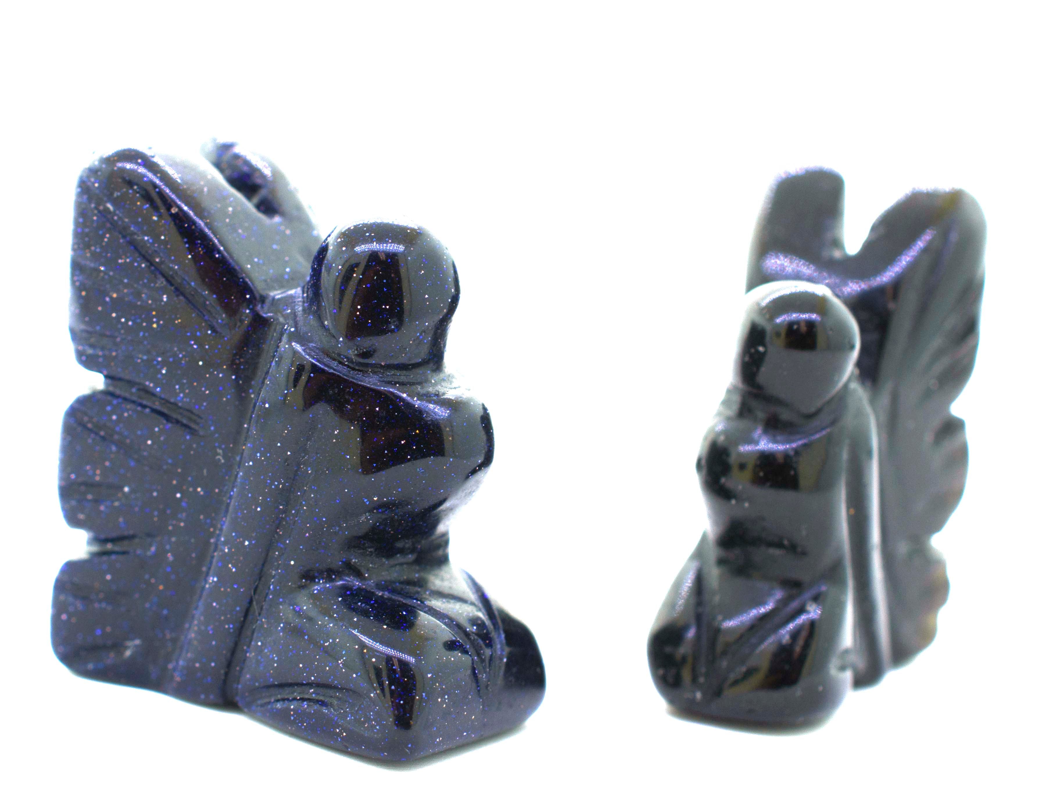 A pair of Carved Fairy Gemstones Figures with wings.