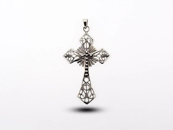 A unique Ornate Cross Pendant with a filigree design from Super Silver.