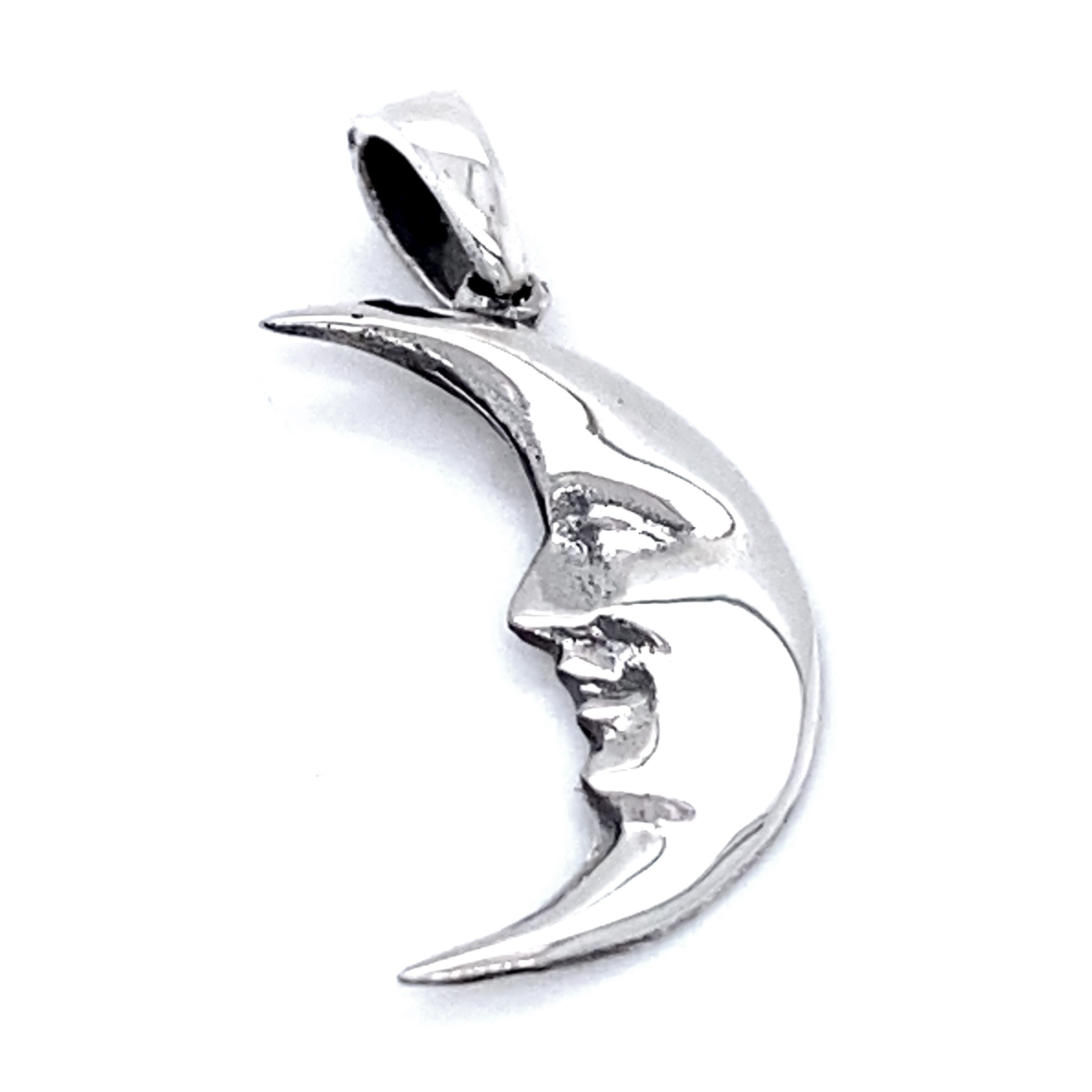 Crescent Man In The Moon Pendant with a human face profile.