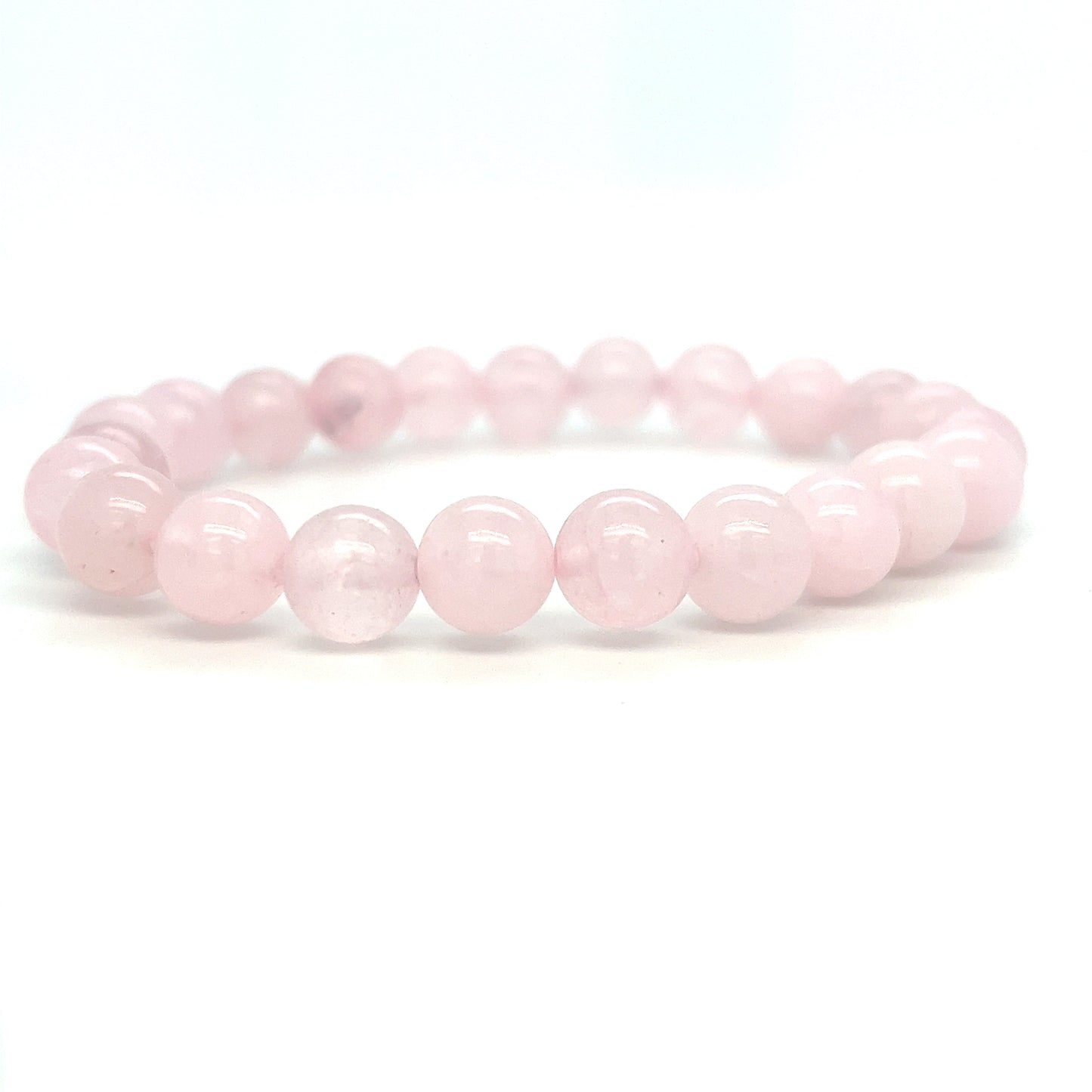 
                  
                    A 4mm Beaded Stone Bracelet made of Rose Quartz beads on a white background.
                  
                