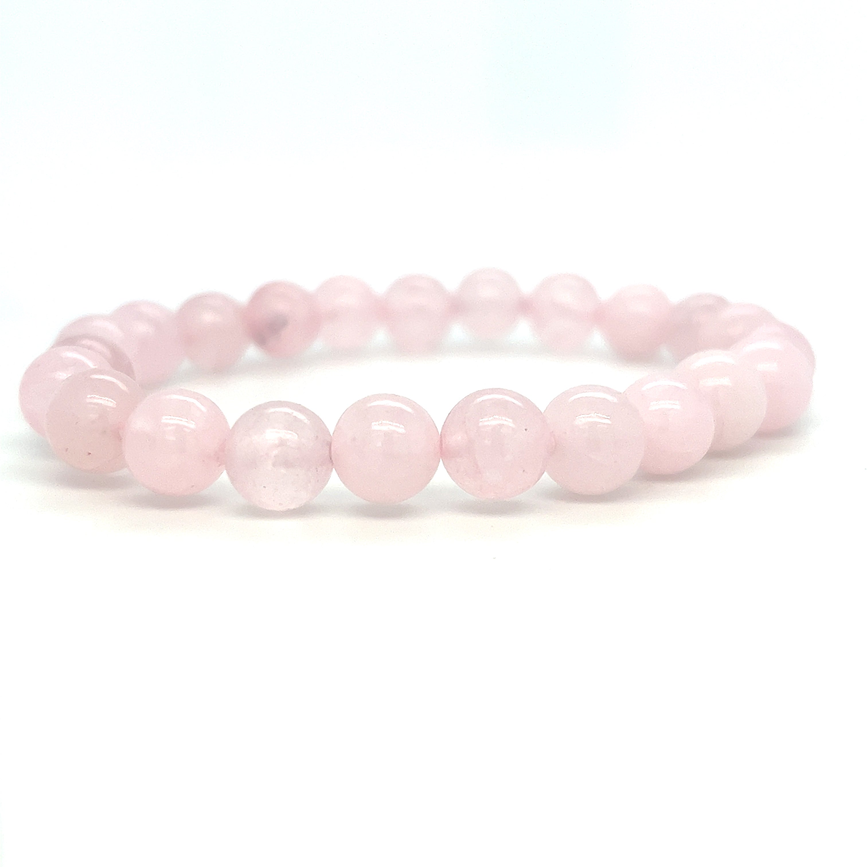 A 4mm Beaded Stone Bracelet made of Rose Quartz beads on a white background.