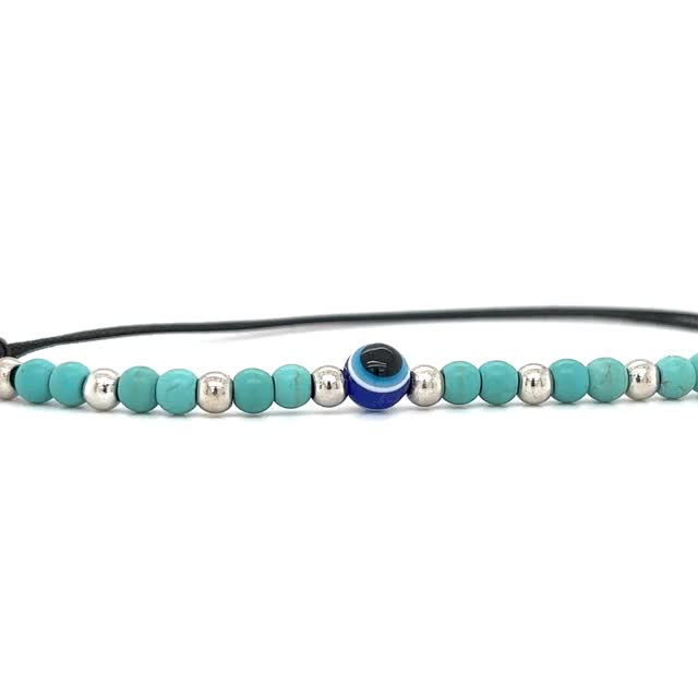A soft Super Silver adjustable Beaded Evil Eye bracelet.