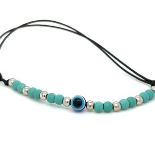 An Adjustable Beaded Evil Eye Bracelet with soft blue beads and Super Silver silver beads.
