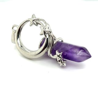 A Moon and Stars Crystal Pendant by Super Silver, featuring an amethyst stone with stars, imbued with the healing properties of the universe.