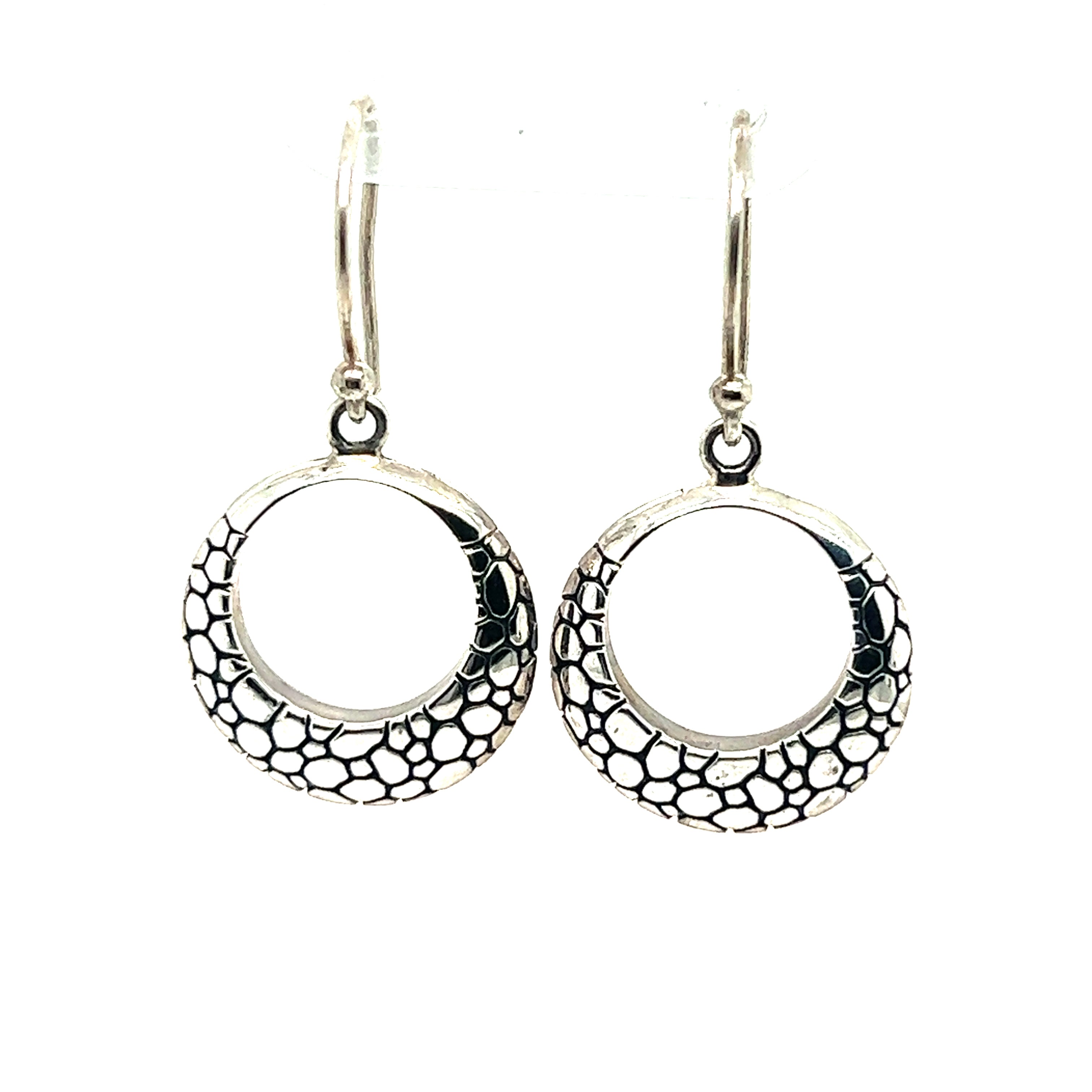 A pair of Super Silver Silver Cobblestone Circle Earrings featuring a modern charm.