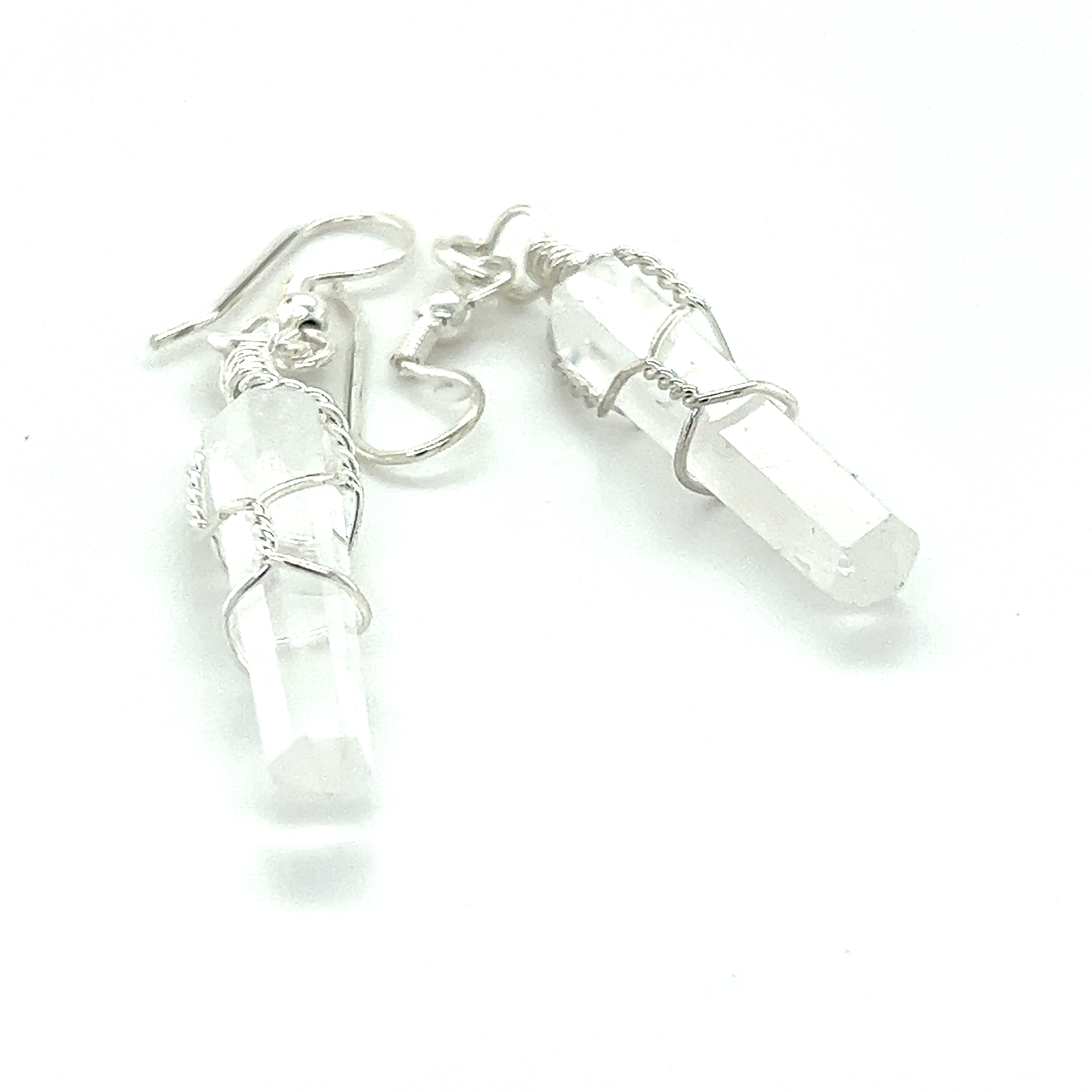 A pair of Super Silver Wire Wrapped Stone Earrings with genuine clear quartz crystals suitable for everyday wear.