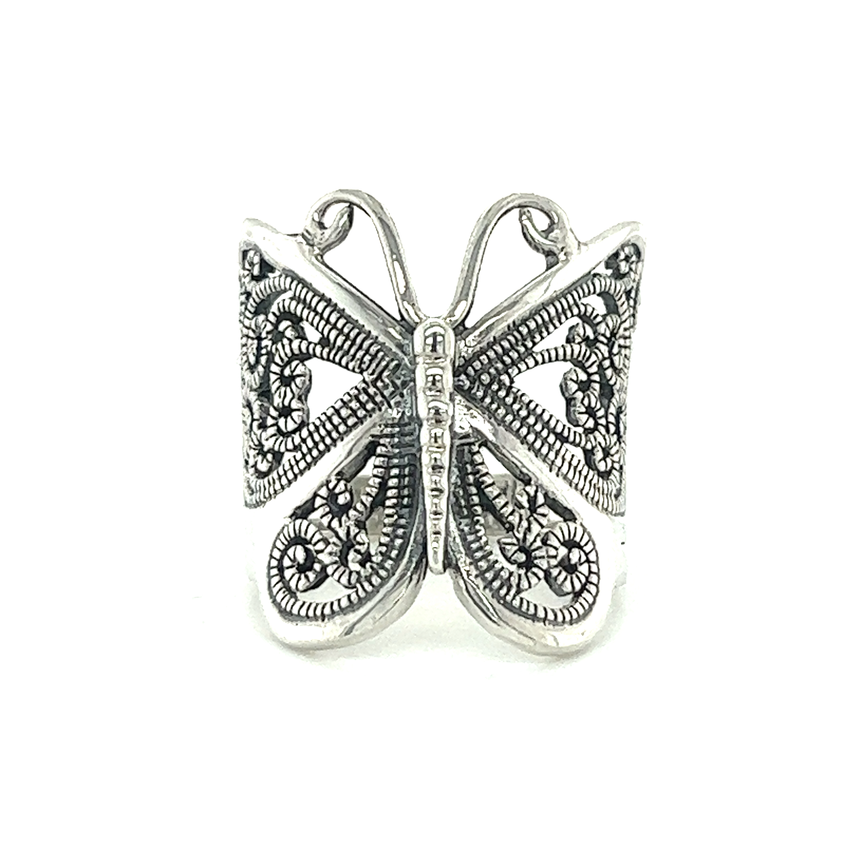A minimalist Large Silver Butterfly Ring with filigree detailing on a white background.