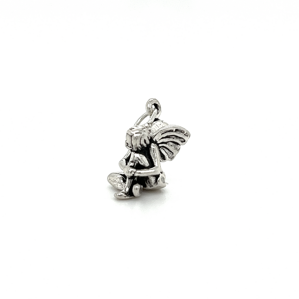 
                  
                    A small Super Silver Fairy Charm with a teddy bear on it, infused with enchantment.
                  
                