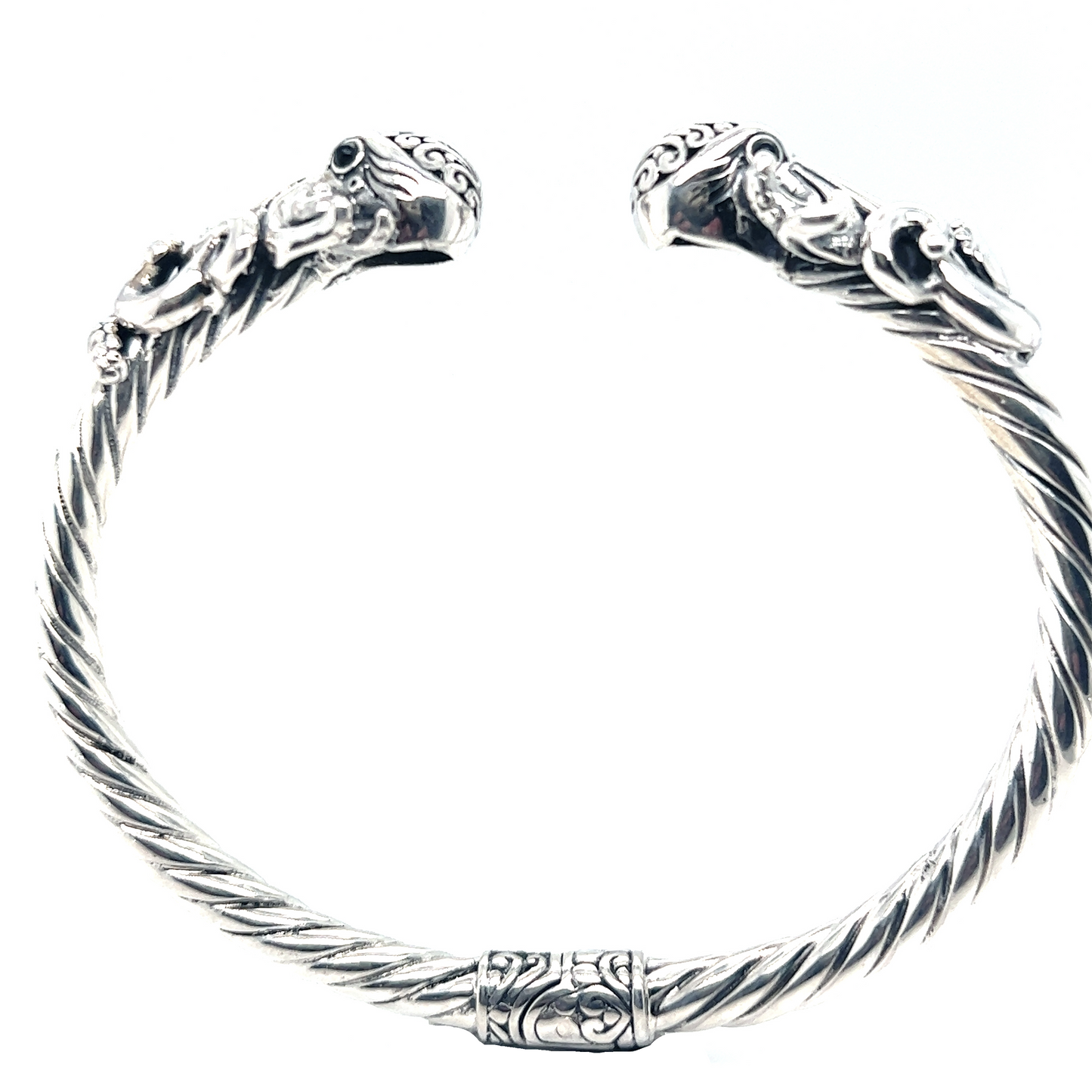 
                  
                    A Twisted Bangle Bracelet with Octopus Ends from Super Silver, a stylish piece of jewelry perfect for adding an edgy touch to any outfit.
                  
                