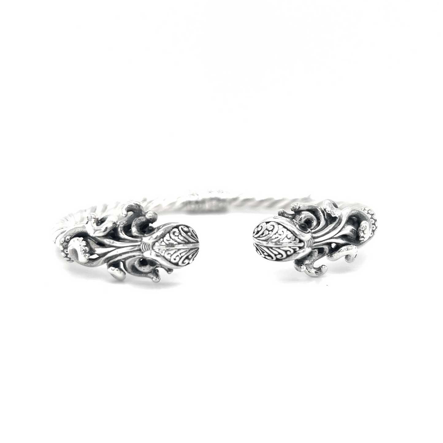 
                  
                    An intricately designed Twisted Bangle Bracelet with Octopus Ends by Super Silver.
                  
                