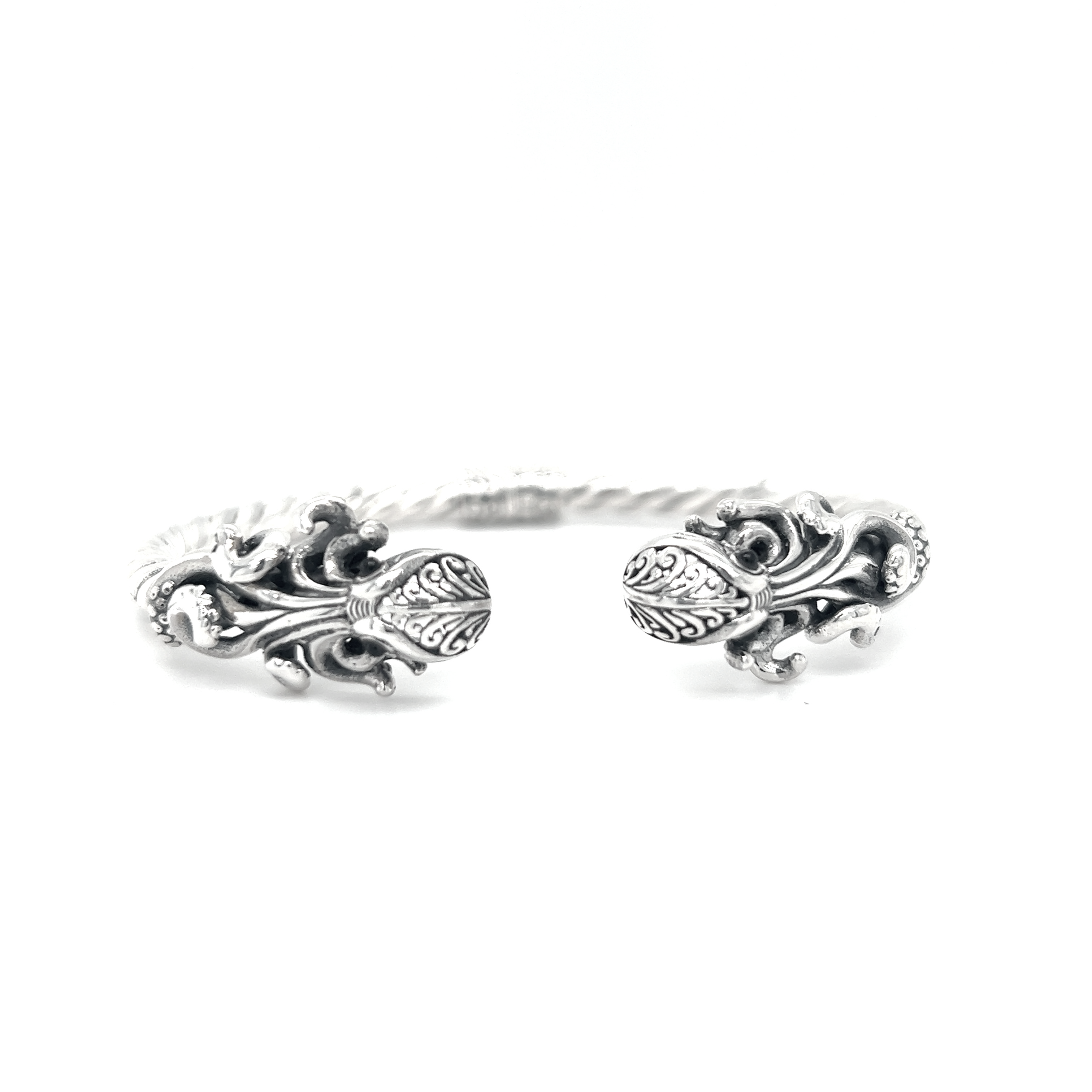 An intricately designed Twisted Bangle Bracelet with Octopus Ends by Super Silver.