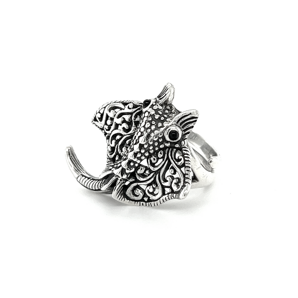 
                  
                    A designer Statement Manta Ray Ring with an adjustable band, featuring an elephant motif.
                  
                