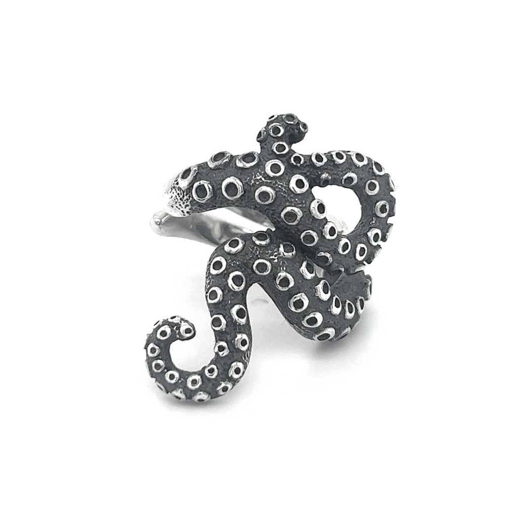 A Statement Octopus Tentacle Ring crafted from sterling silver, set against a pristine white background.
