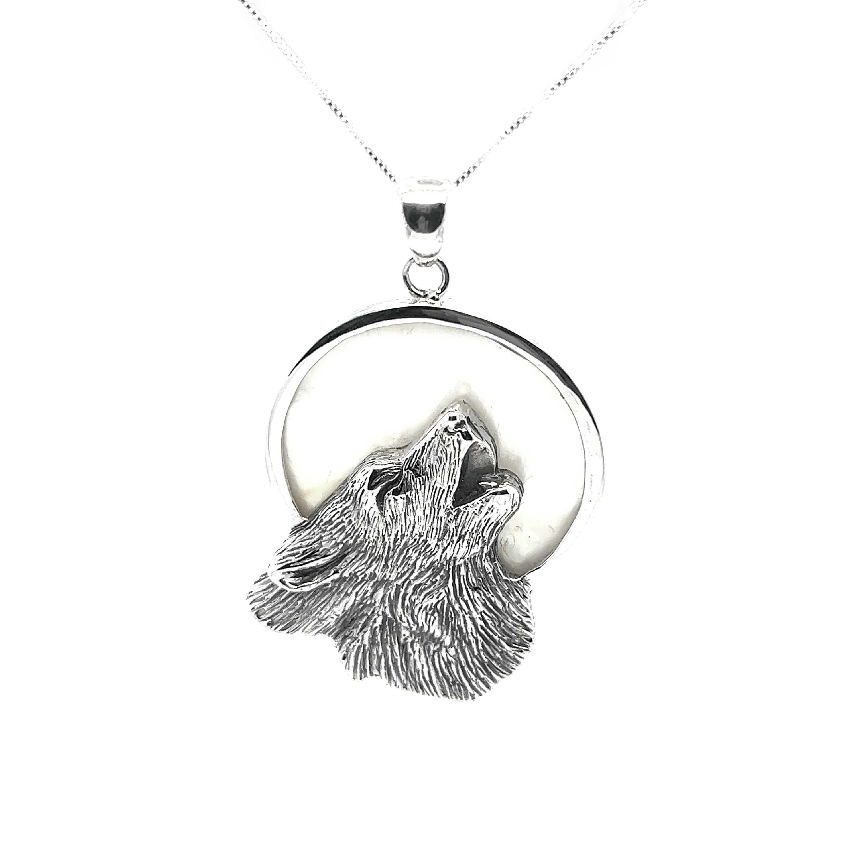Super Silver's Wolf Howling At The Full Moon pendant in sterling silver.