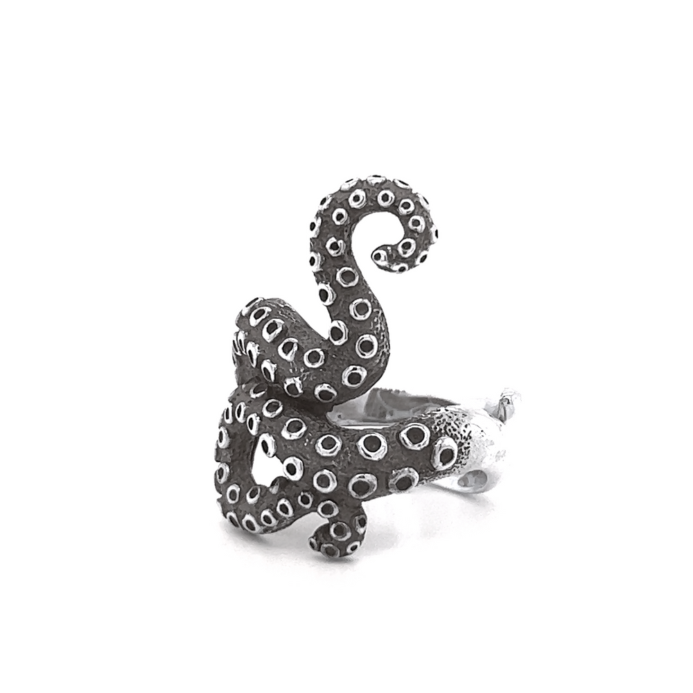 
                  
                    A Statement Octopus Tentacle Ring with intricate tentacle design, showcased on a pristine white background.
                  
                