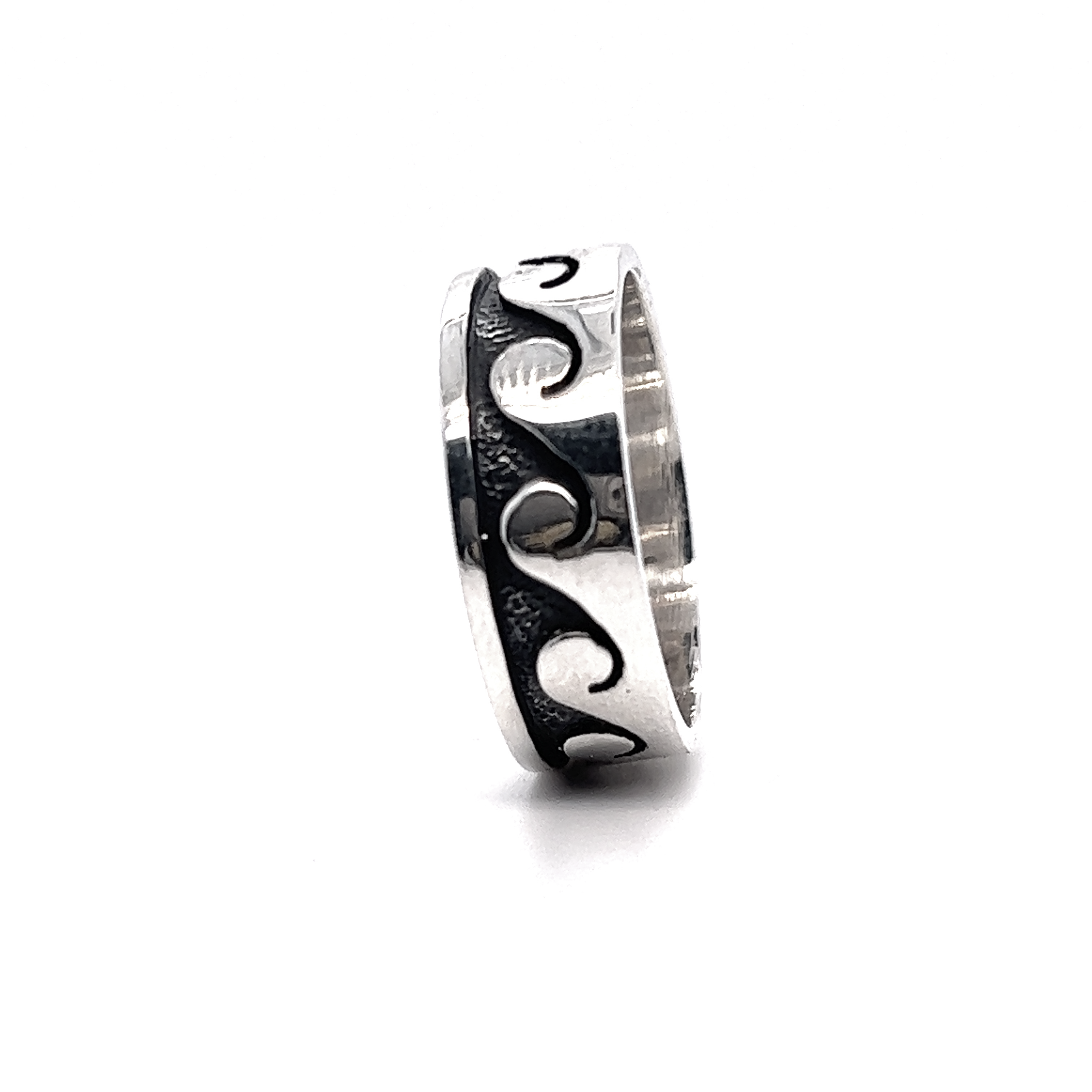 A silver 8mm Wave Band with wave designs on it.
