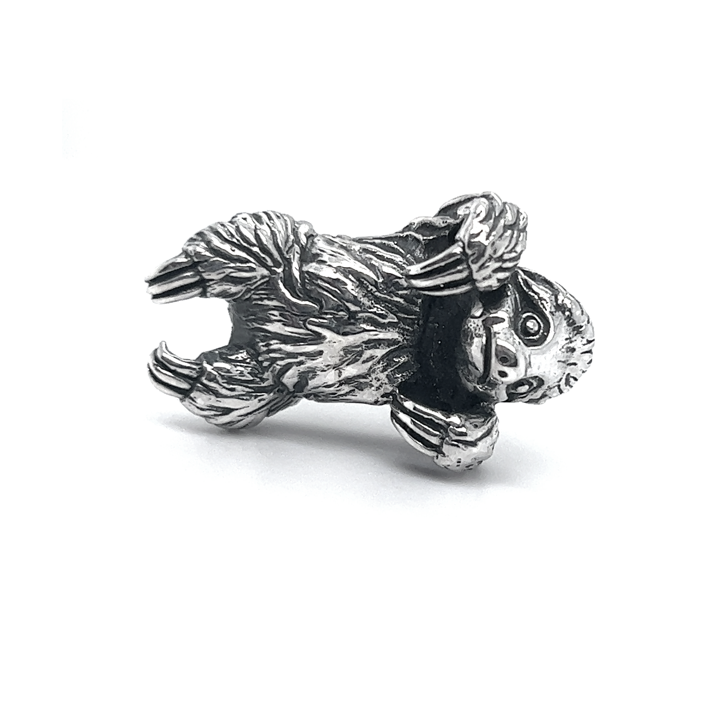 A meticulously crafted silver ring featuring a whimsical Super Silver sloth pendant.