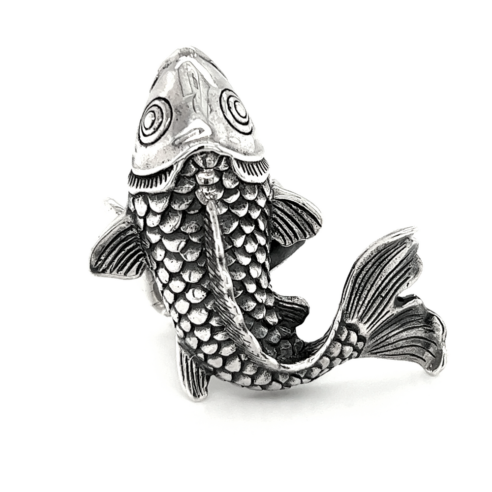 
                  
                    An artisan Detailed Statement Koi Fish Rings with a Santa Cruz style.
                  
                