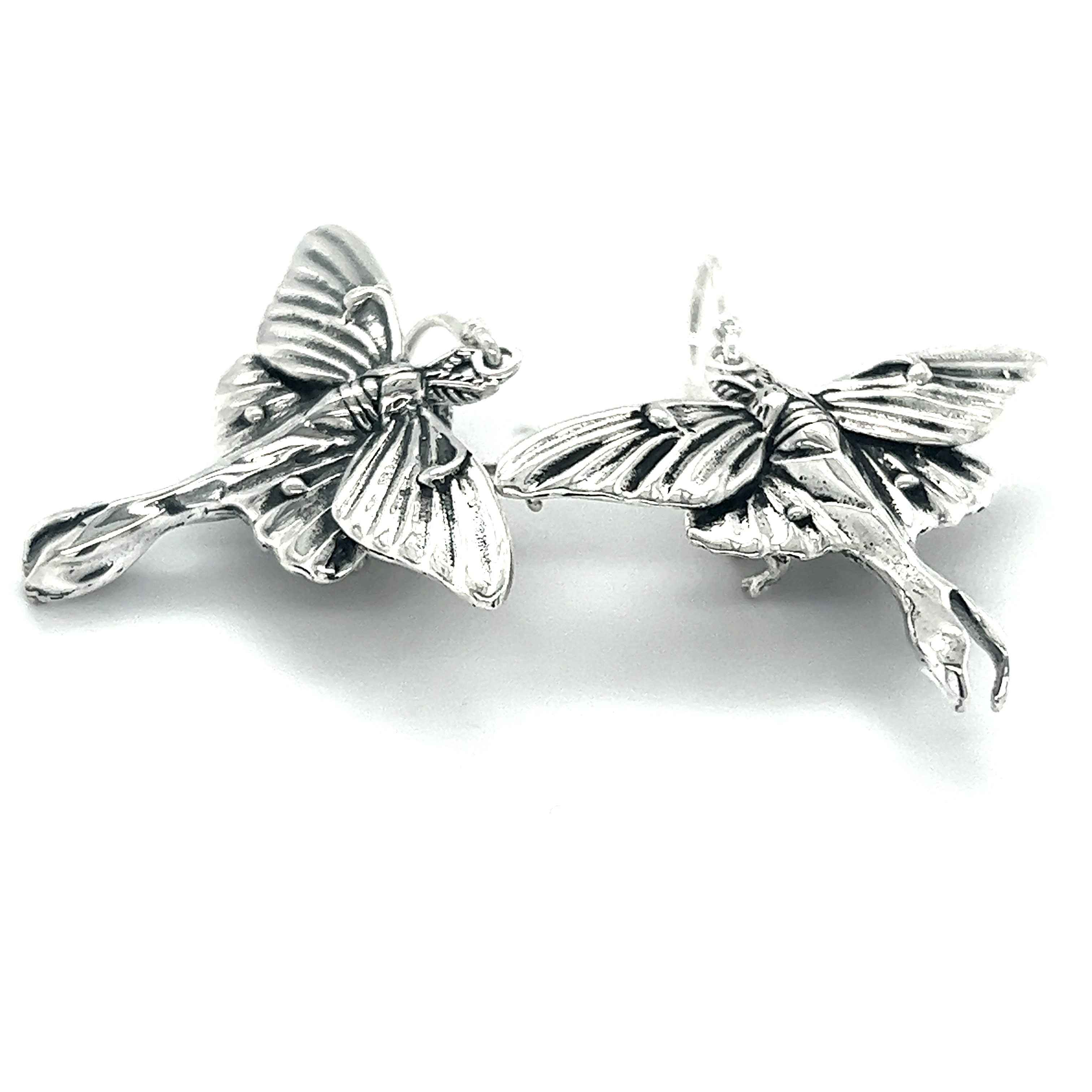 A pair of enchanting Super Silver Statement Lunar Moth Earrings adorned with delicate wings reminiscent of a lunar moth.