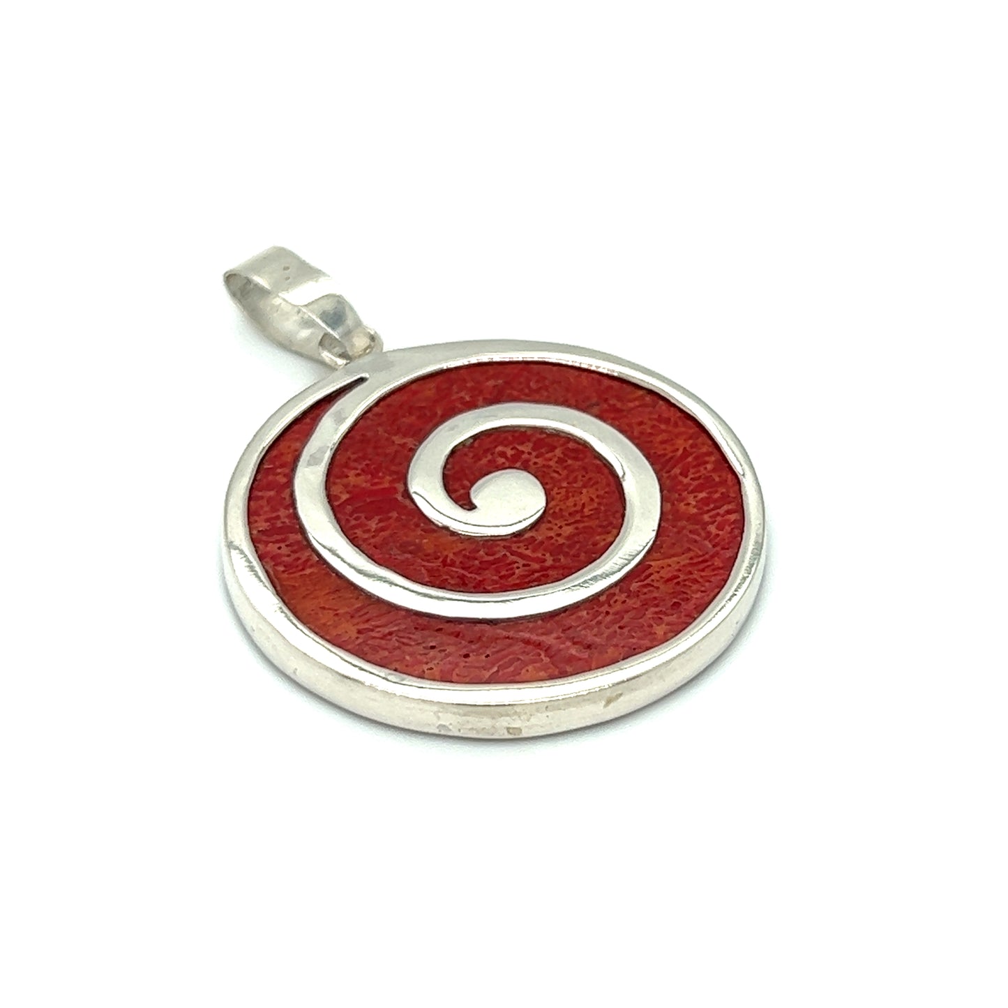 A Coral Spiral Pendant on a white background. This stunning pendant features a spiral design in vibrant red hue, crafted with .925 Sterling Silver for an exquisite touch.