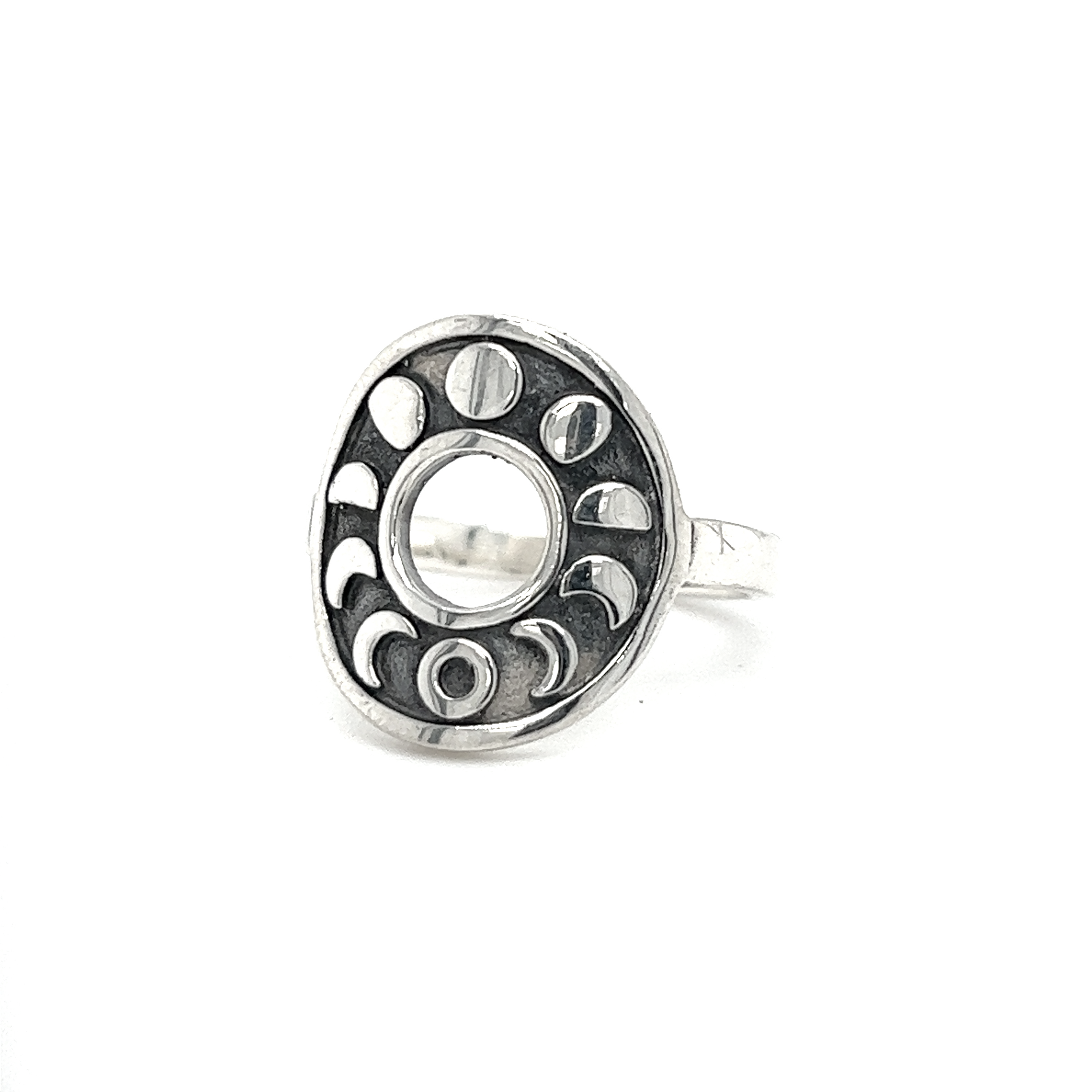 A Striking Circular Moon Phases Ring by Super Silver, featuring a mesmerizing crescent moon.