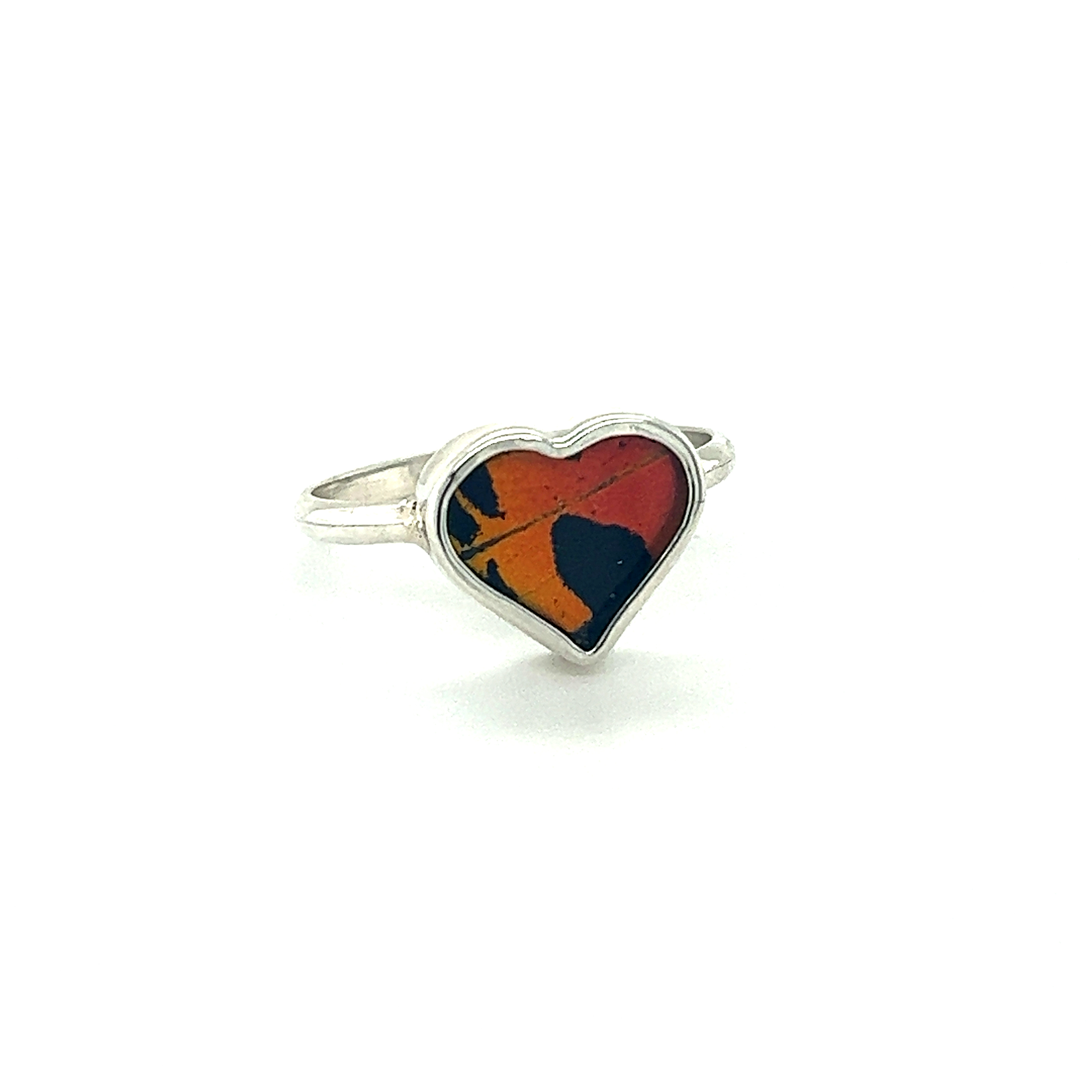 A genuine butterfly rings in heart shape with a colorful orange and red heart.