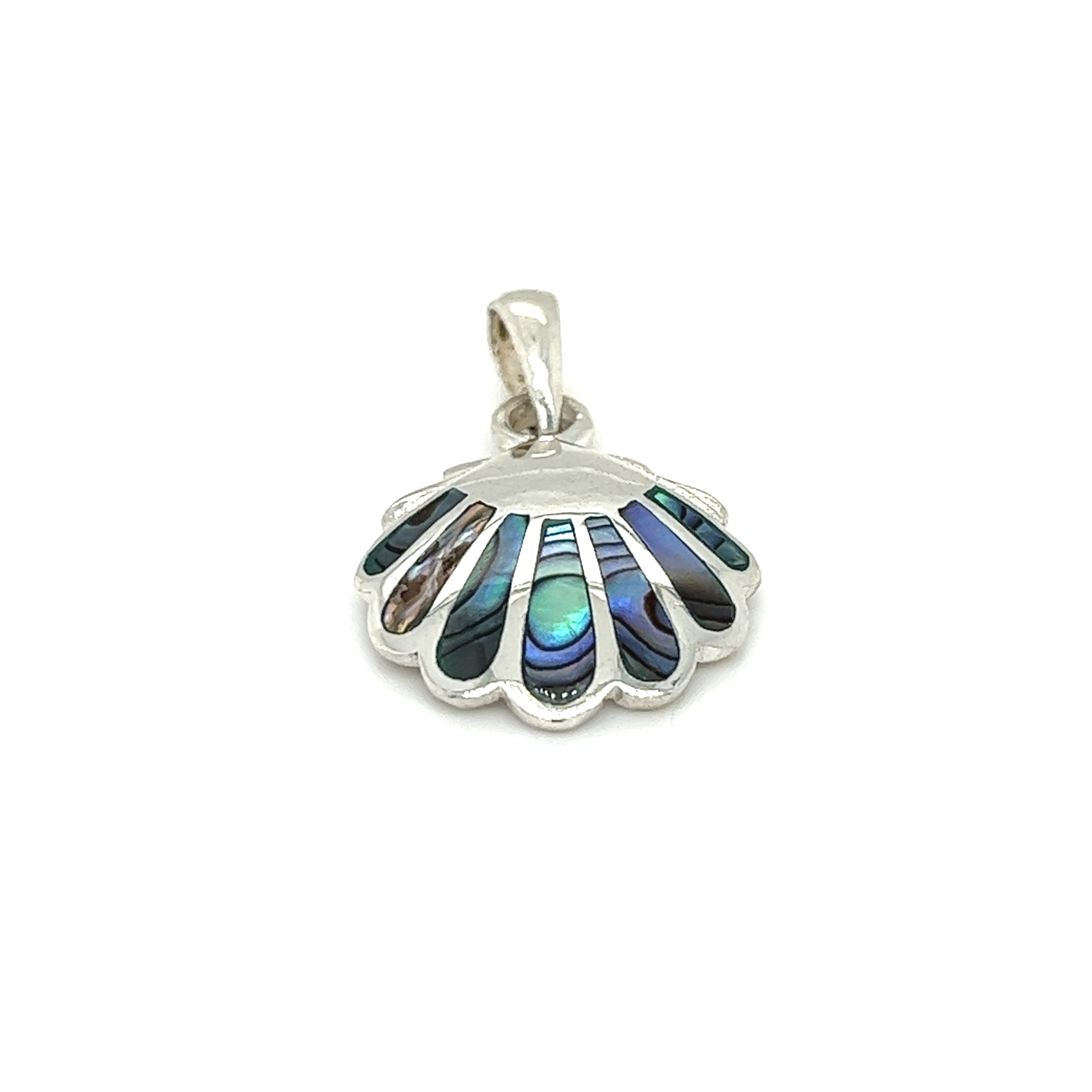 A clam shell pendant surrounded by inlay stones and showcasing oceanic beauty on a white background.
