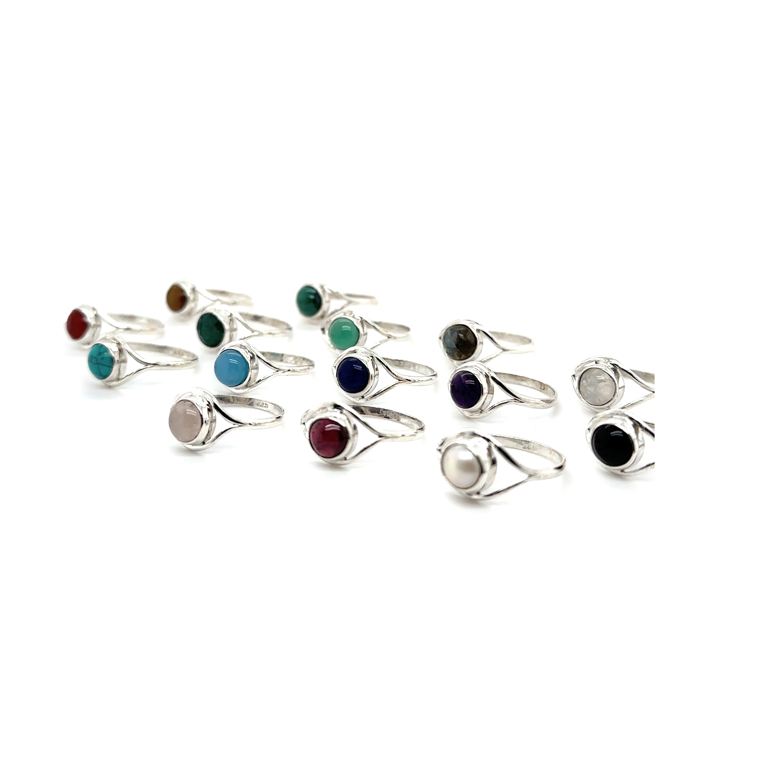 A contemporary aesthetic group of Abstract Stone Eye Rings adorned with gemstones of different colors.