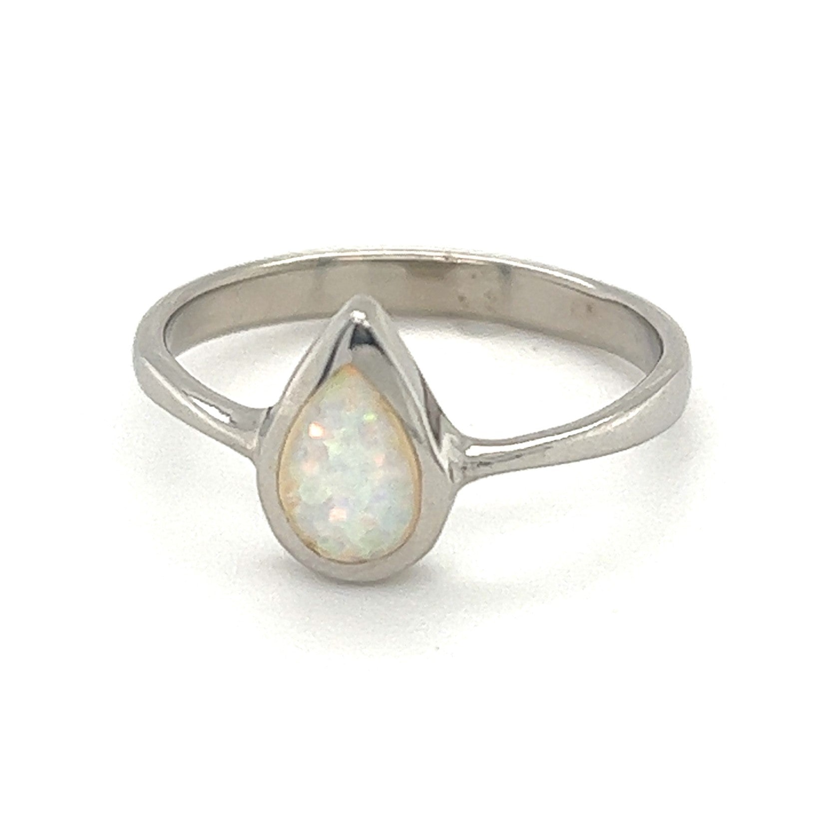 Teardrop Shaped Opal Ring with a pear-shaped lab-created Opal stone.