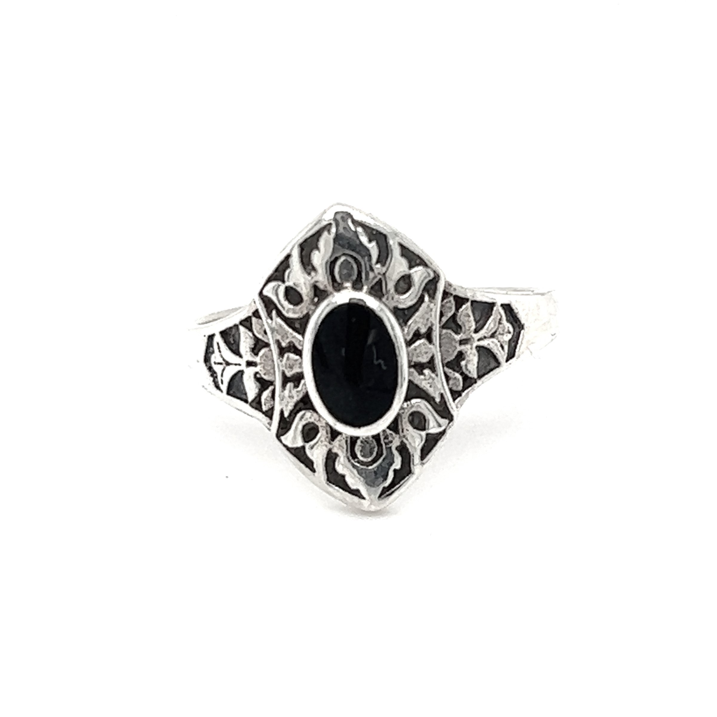 A Marquise Shield Ring With Inlaid Stones with a black onyx stone inlaid in its shield design.