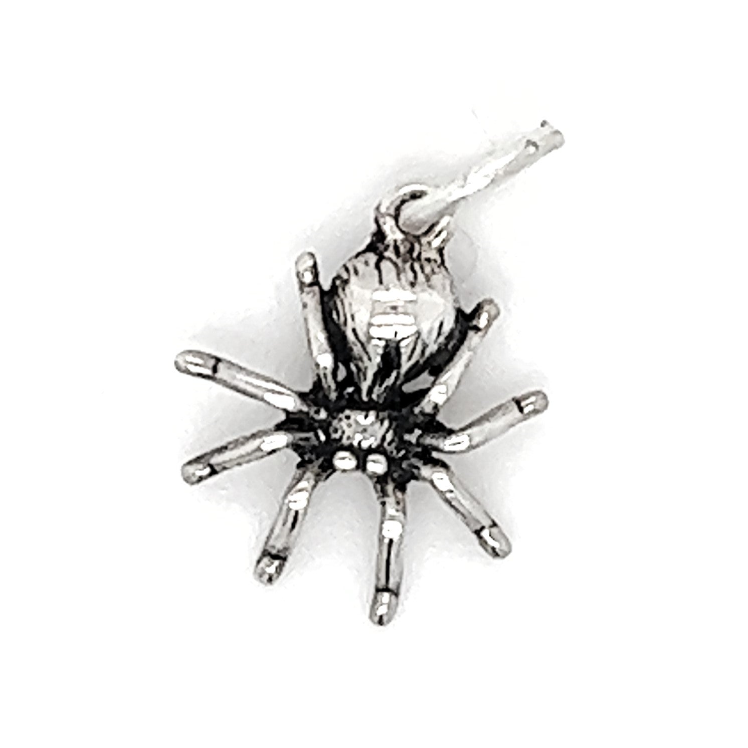 A Tiny Haunting Spider Charm made of .925 Sterling Silver on a white background.