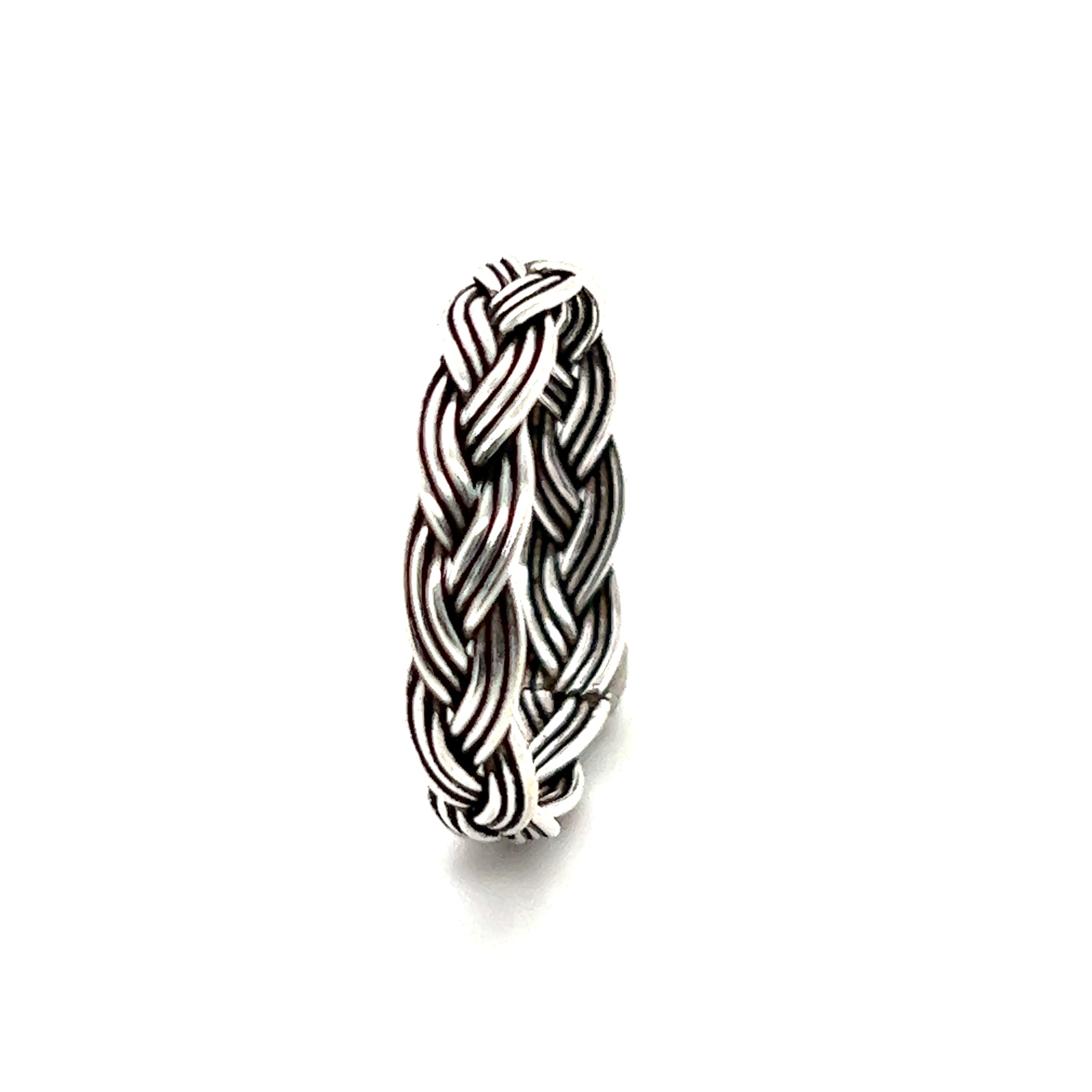 A Super Silver Triple Strand Braided Bands ring, adding a minimalist bohemian flair.