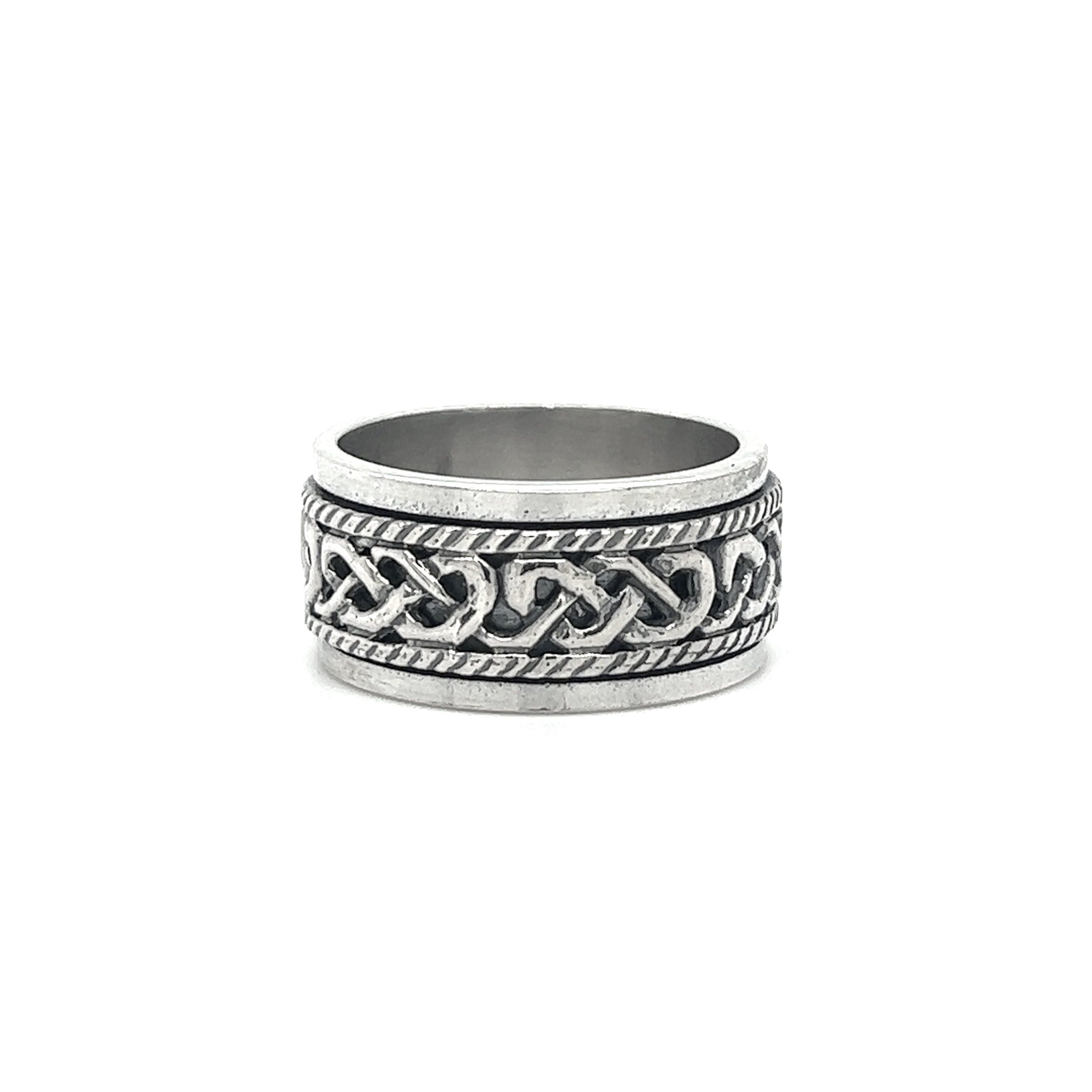 A silver ring with a Spinner Ring With Celtic Knot And Rope design.