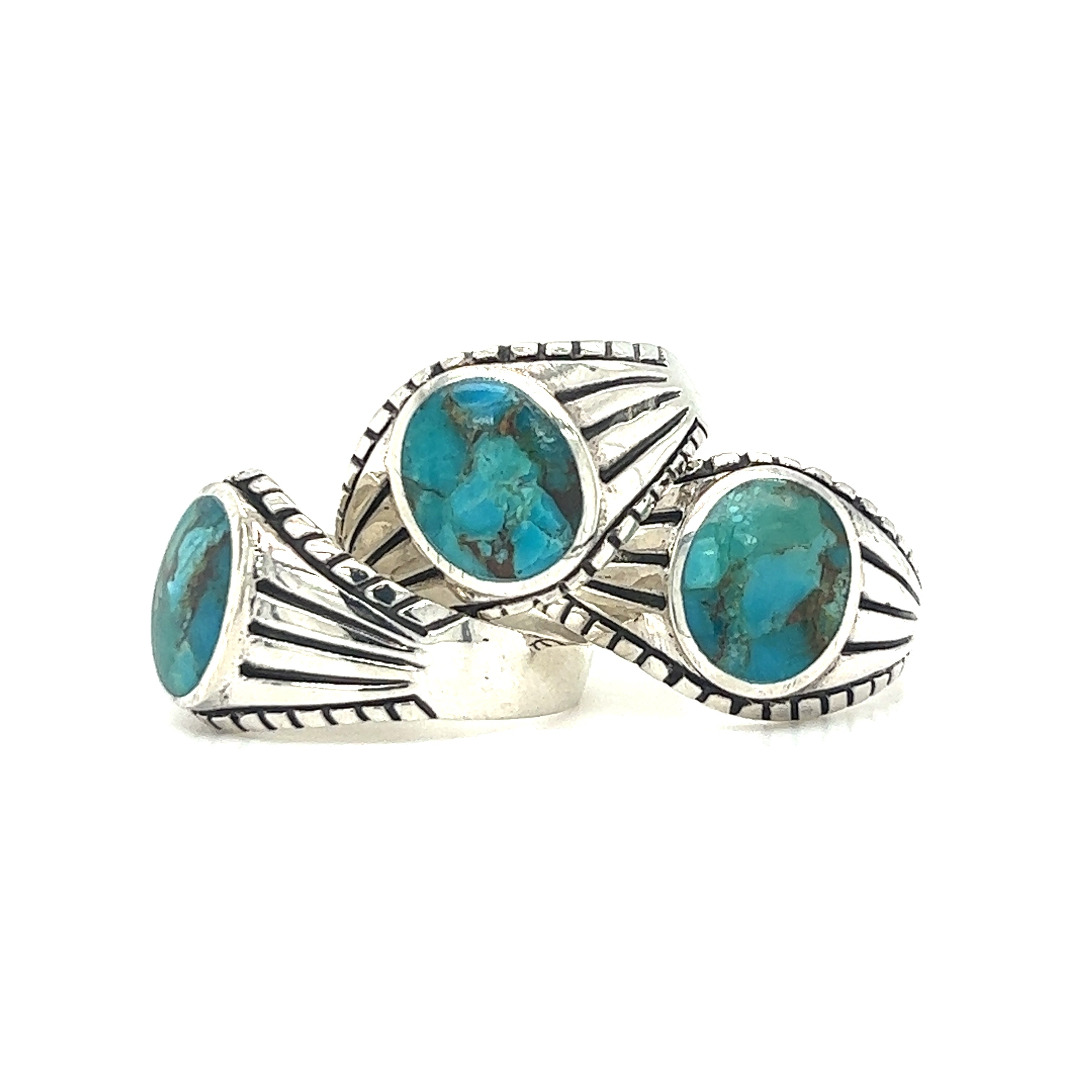 A pair of Oval Signet Stone Rings In Classic Vintage Style with turquoise stones.