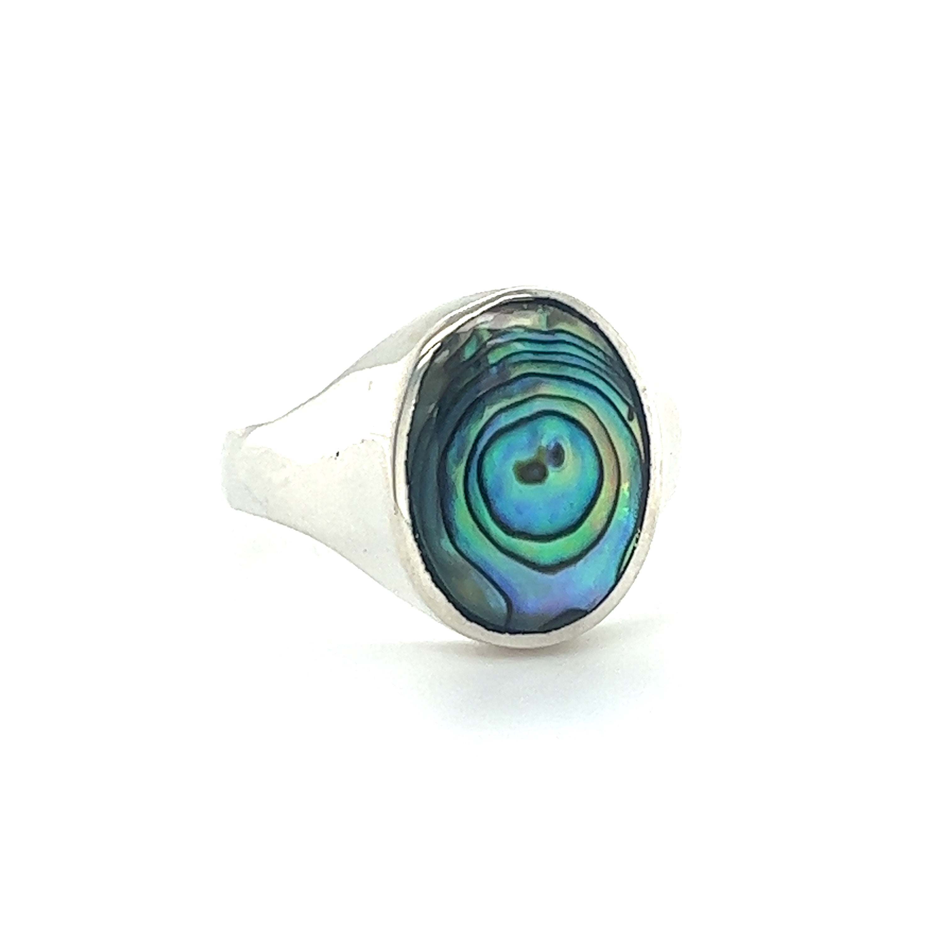 A sleek oval inlaid stone signet ring on a white background.