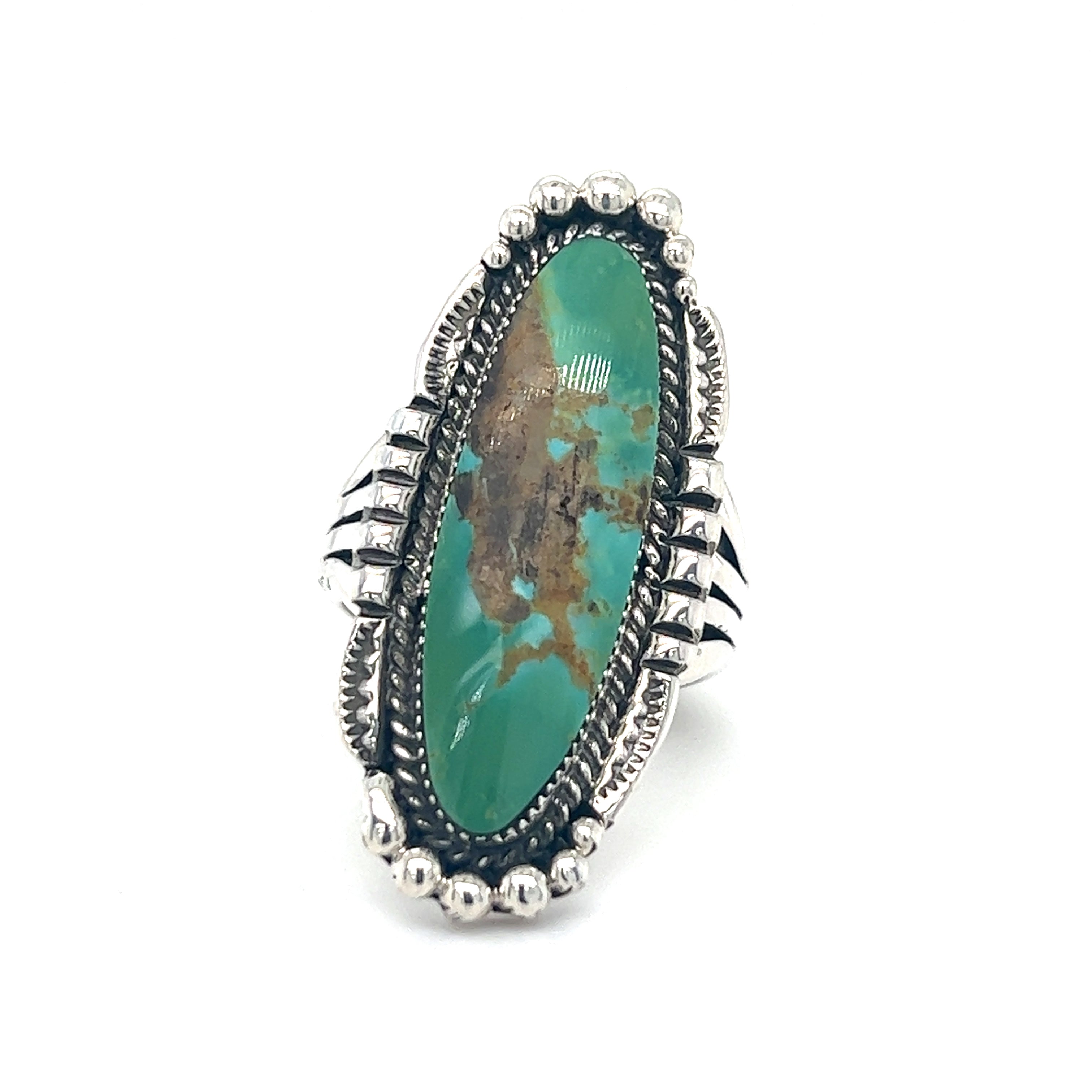 A Statement Native American Turquoise ring with a turquoise stone.
