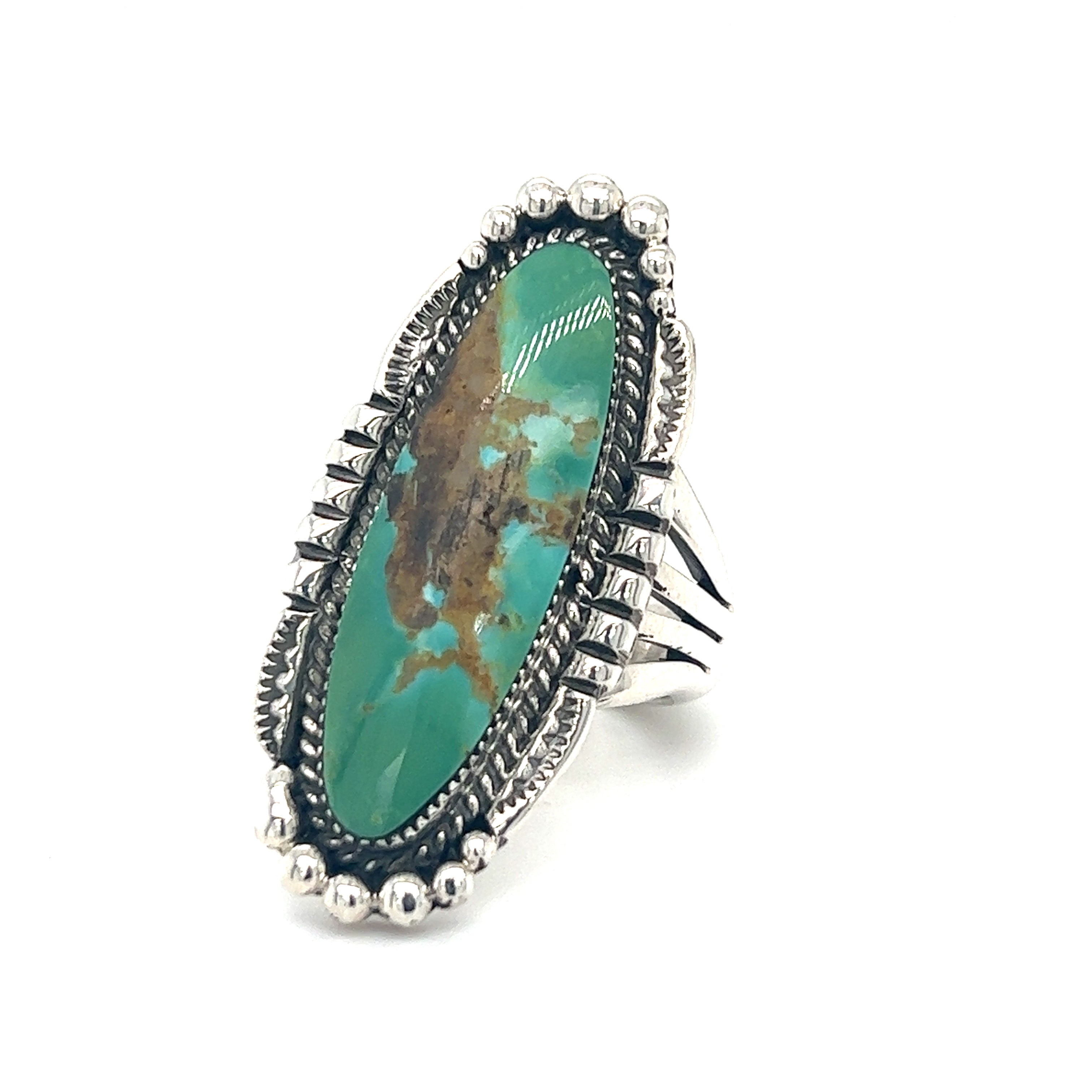 A Statement Native American Turquoise Ring with a turquoise stone.