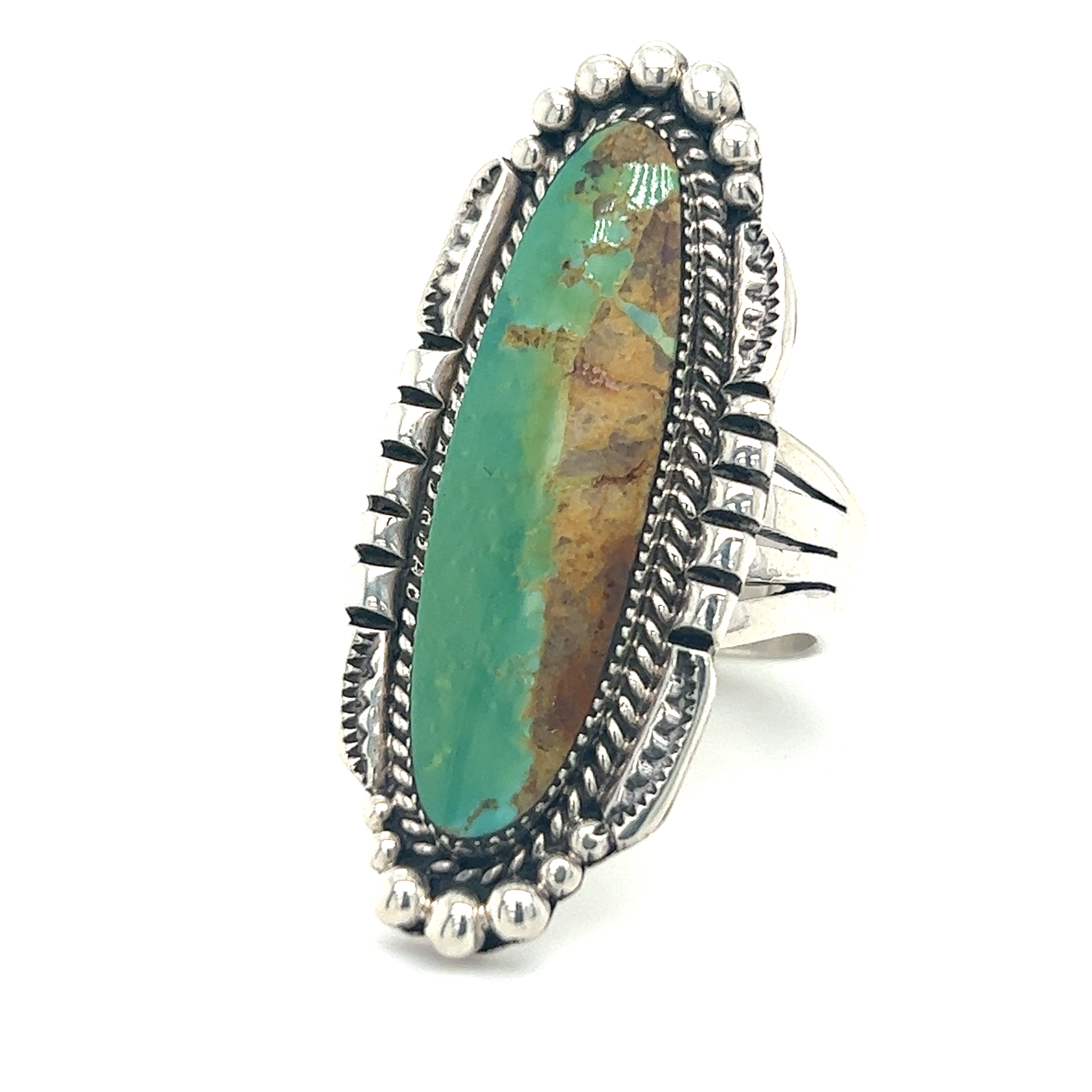 A Statement Native American Turquoise Ring with a turquoise stone.