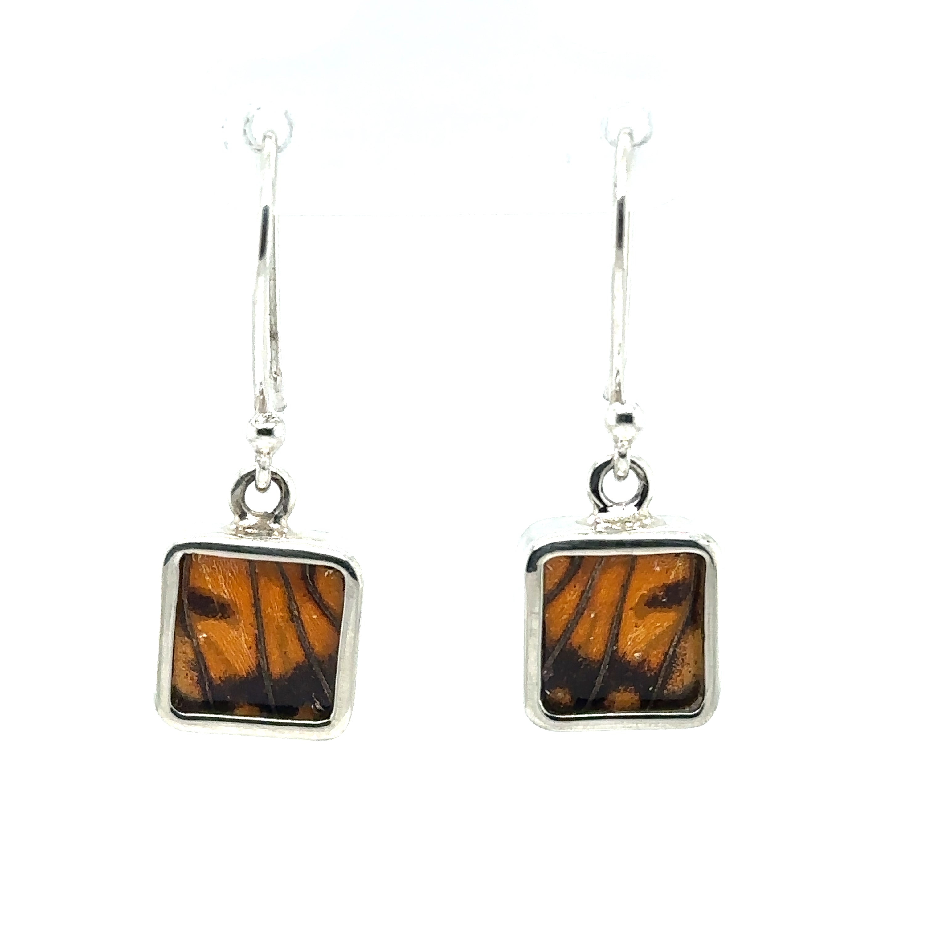 A pair of Small Butterfly Wing Earrings, made of sterling silver and in a square shape, making them a unique statement piece.