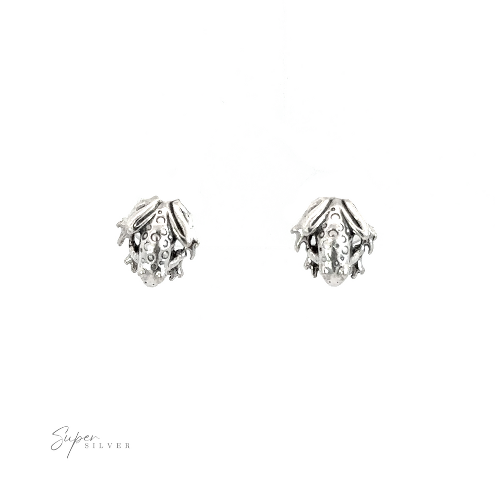 A pair of nature-inspired Frog Studs with diamond accents, perfect for adding a touch of elegance to your accessories collection.