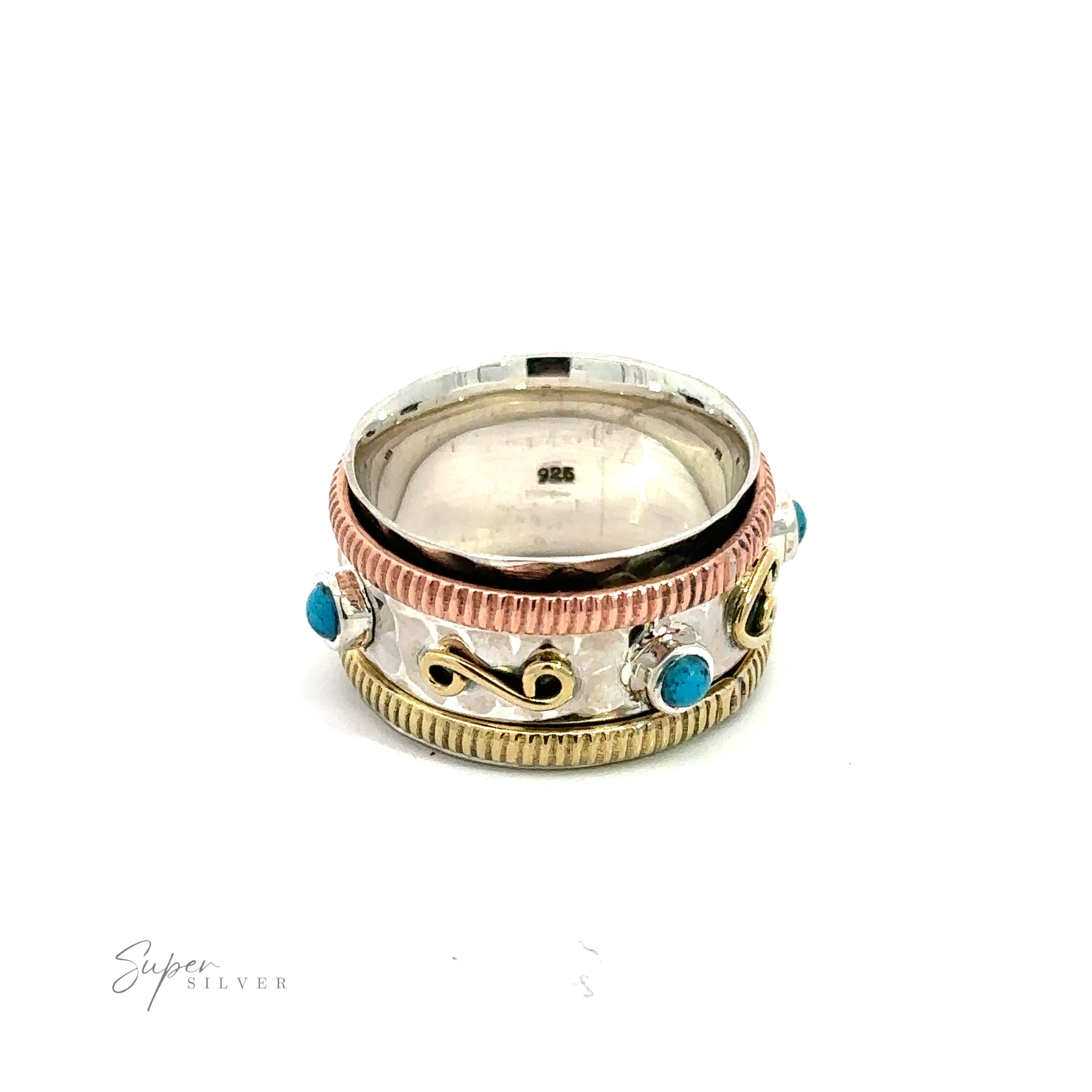 A Handmade Tricolor Turquoise Spinner Ring with turquoise stones and mixed metal design.