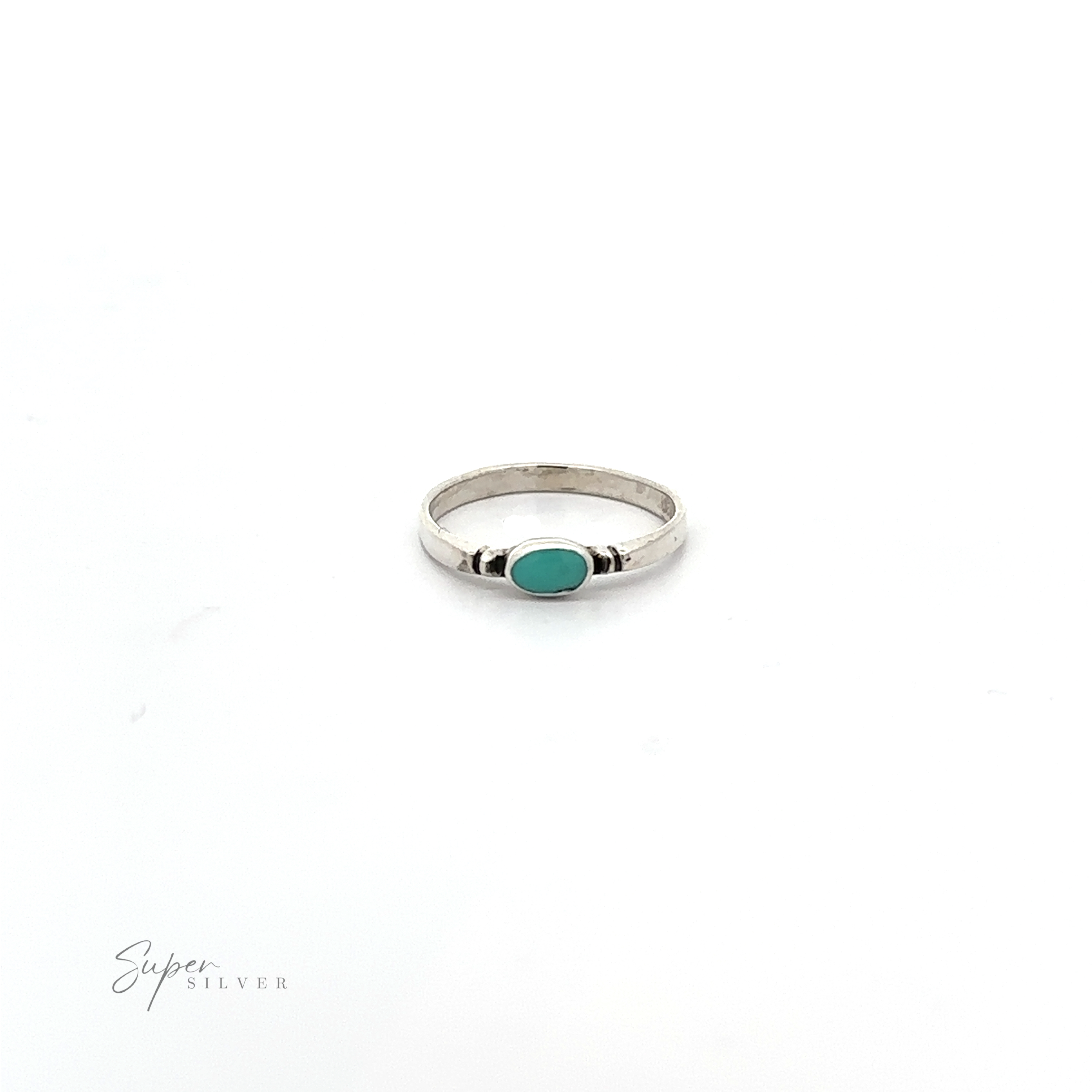 A dainty and sleek Small Horizontal Oval Inlay Ring with a turquoise stone.