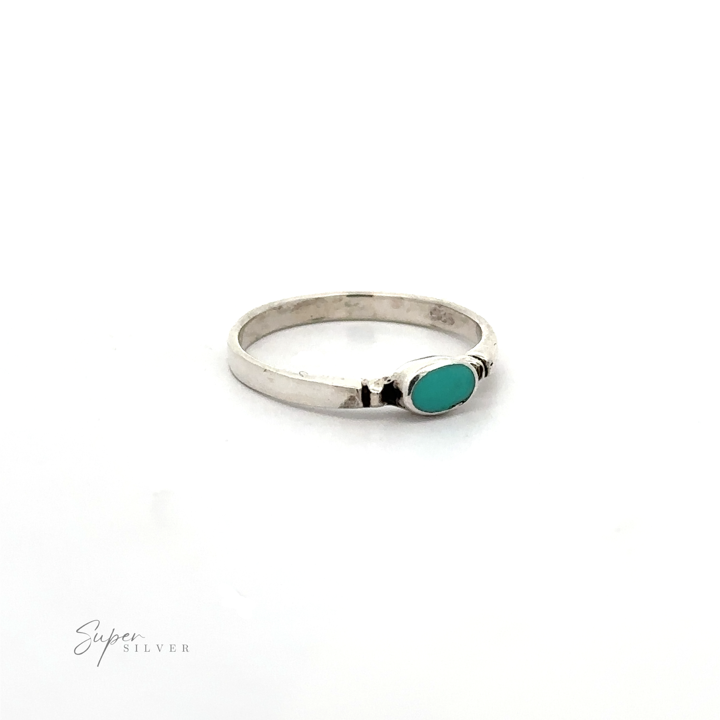 A dainty and sleek sterling silver ring with a Small Horizontal Oval Inlay turquoise stone.