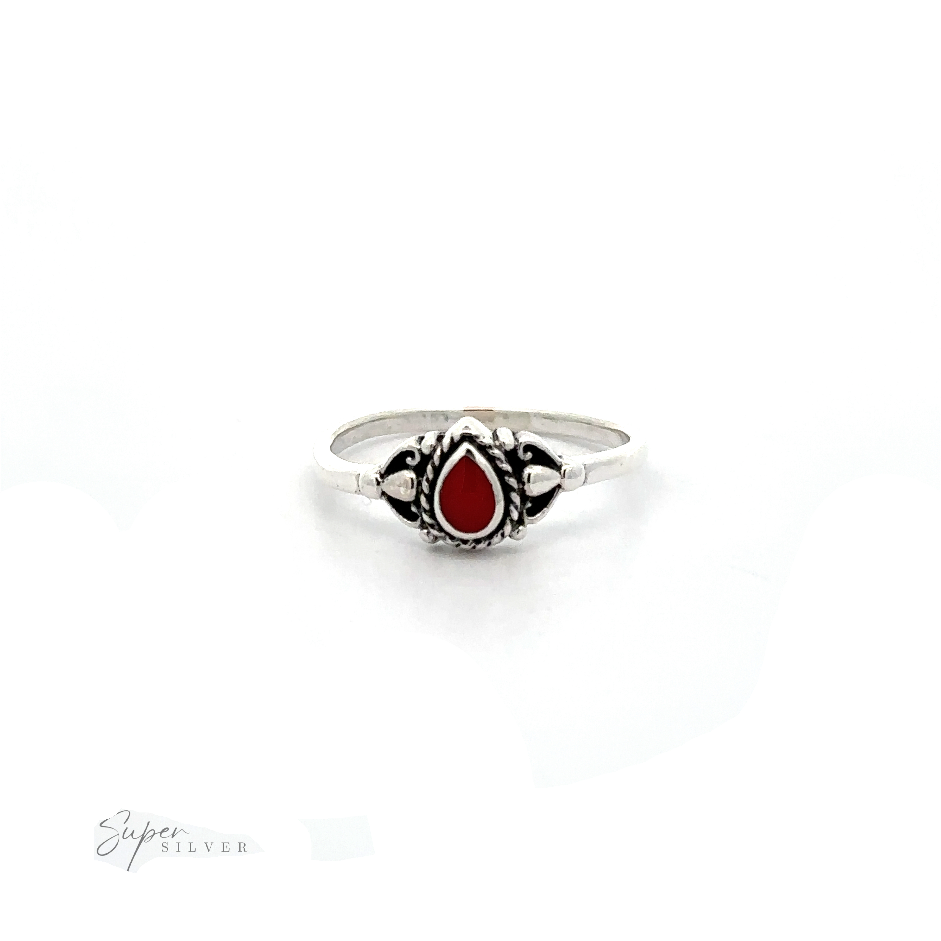 A Delicate Teardrop Inlay Stone Ring with Vintage Look with an inlaid red stone.