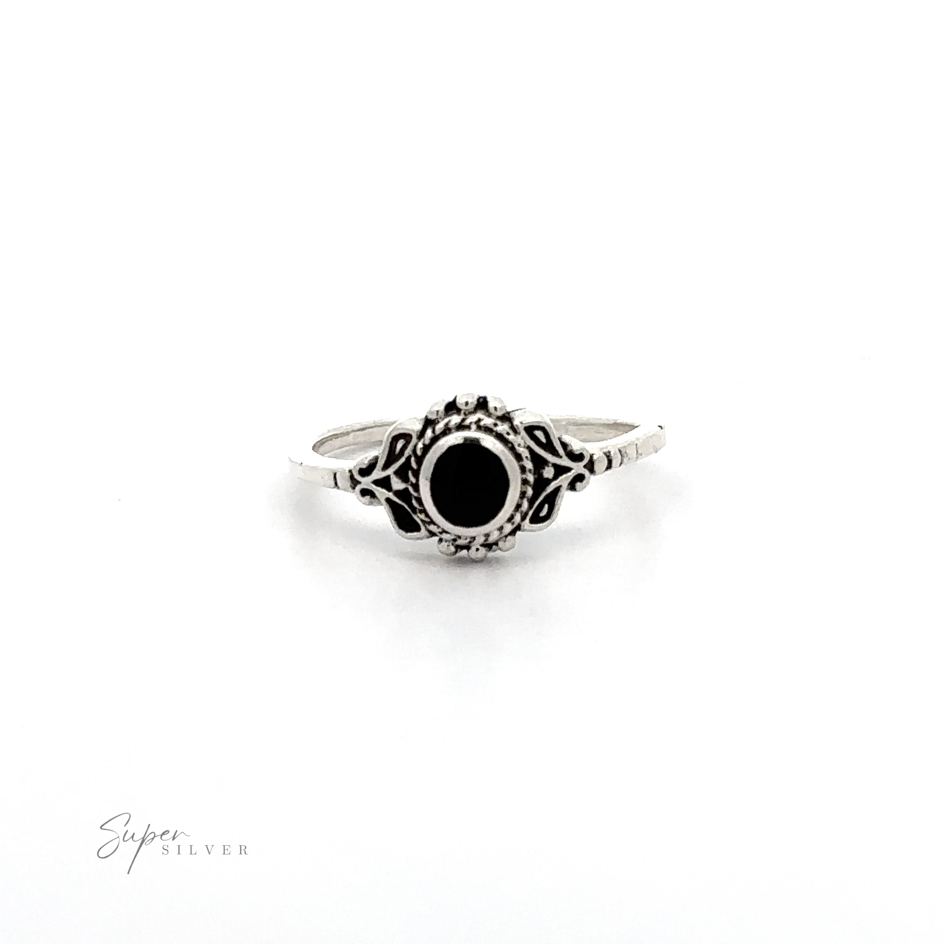 A Dainty Inlaid Stone Ring with Filigree with a black onyx stone.
