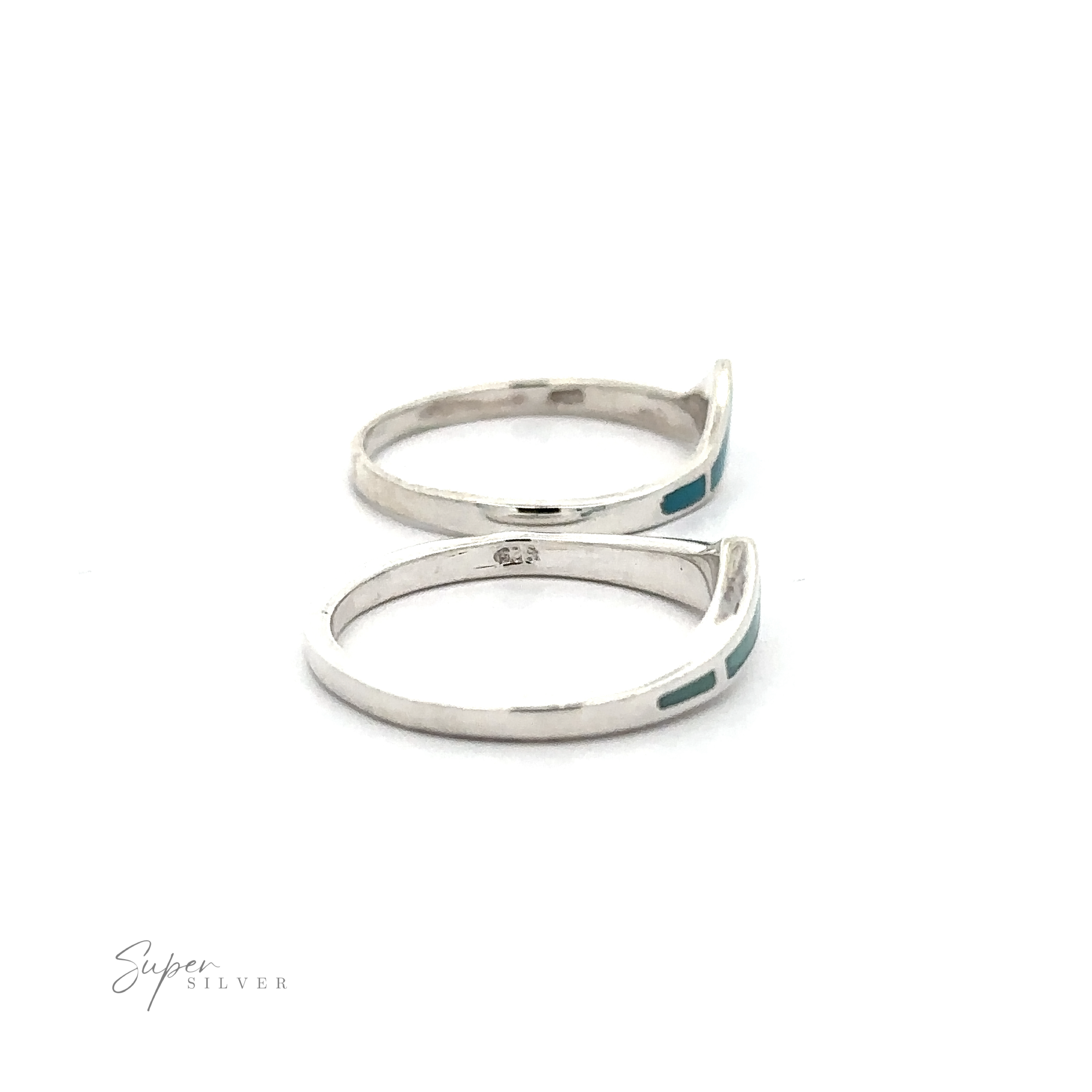 A trendy chevron ring with inlaid stones.