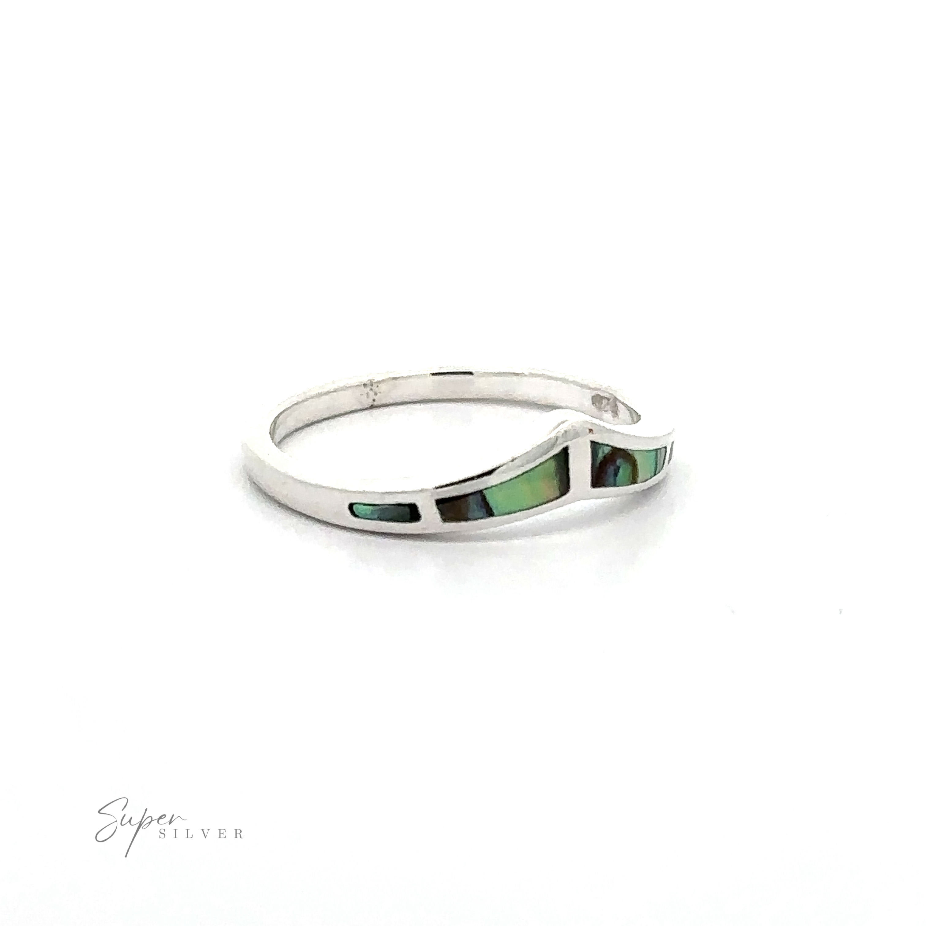 A trendy Chevron ring with inlaid stones on a white background.