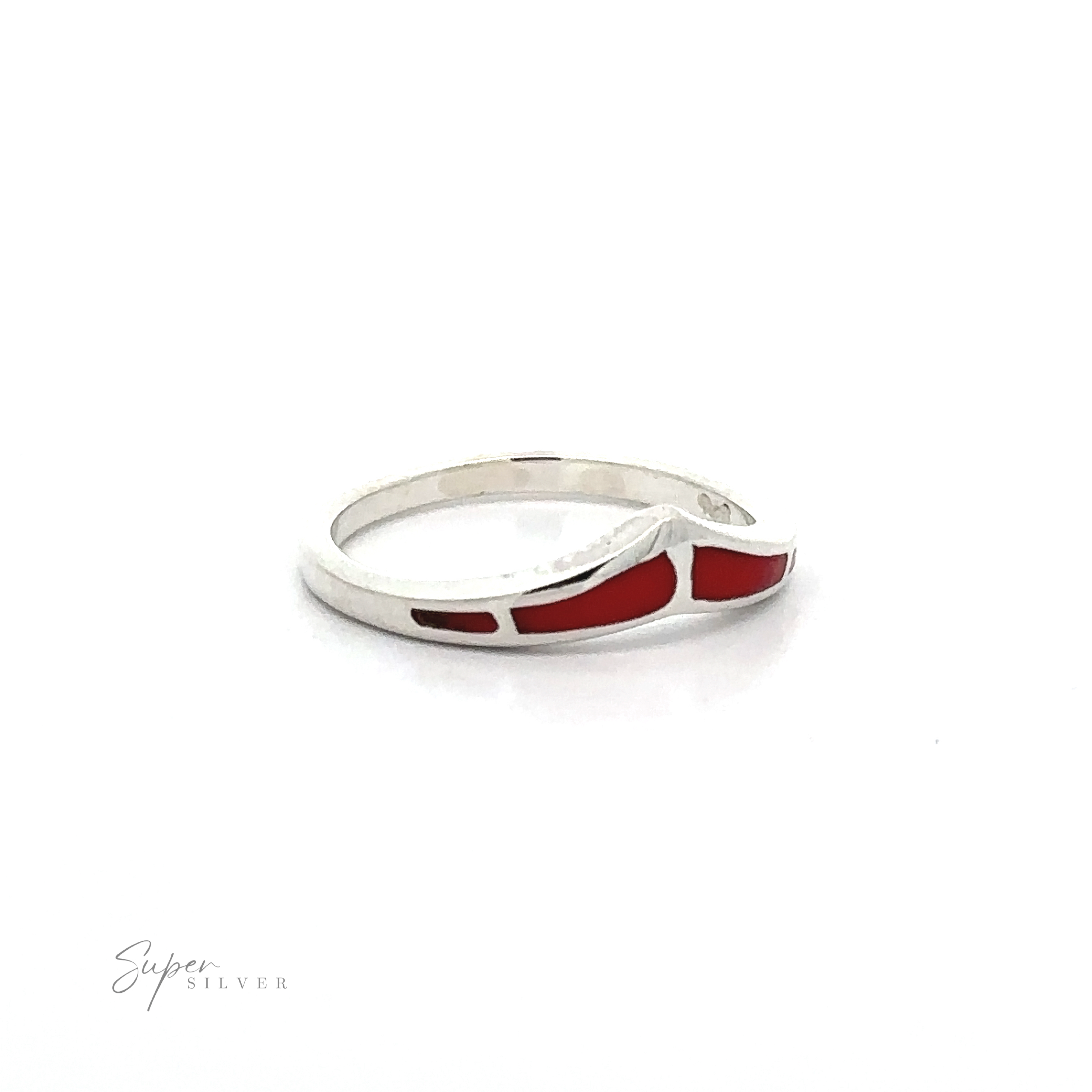 A Trendy Chevron Ring With Inlaid Stones with a red stone inlay.