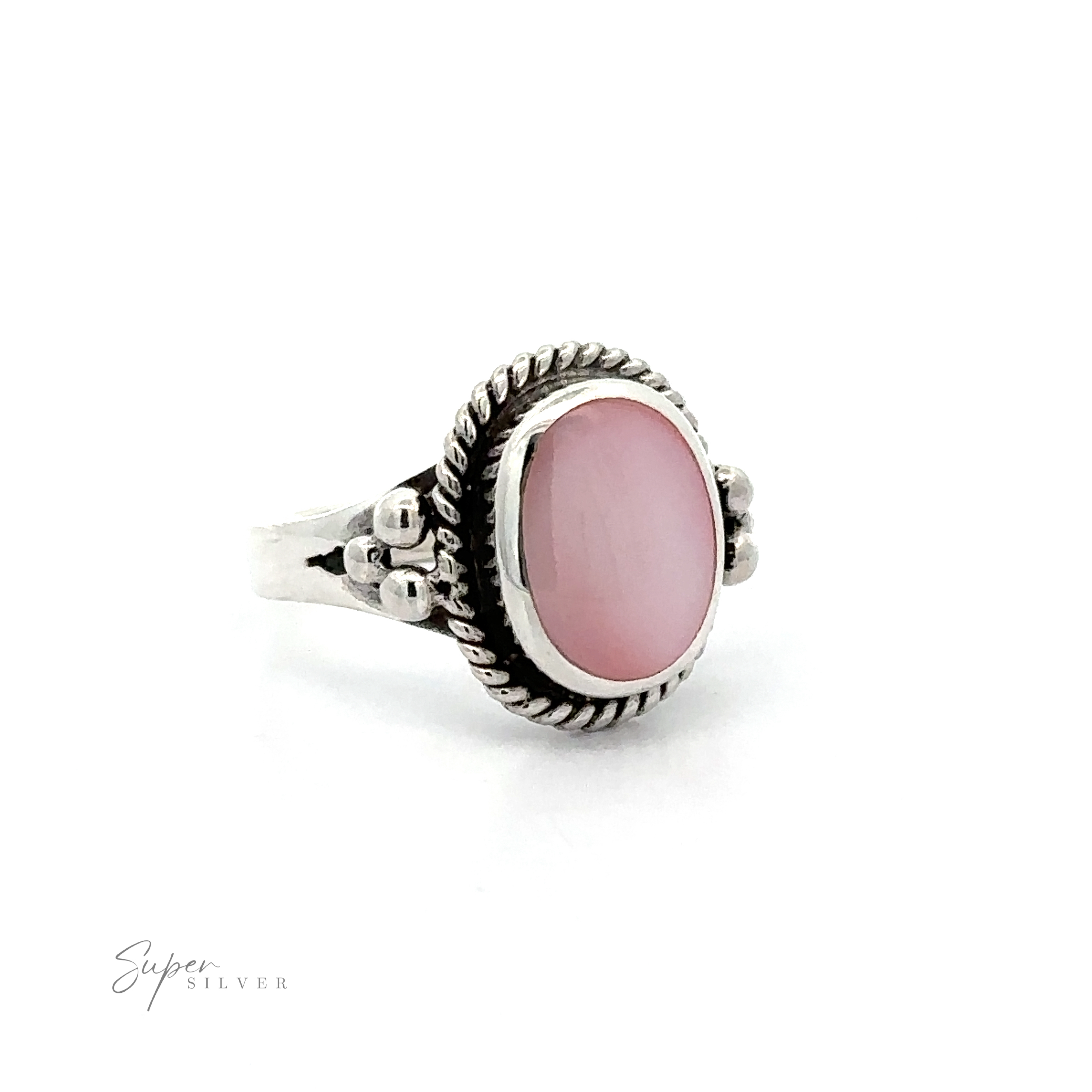 A close up of an Oval Ring with Rope Setting and Inlaid Stones.