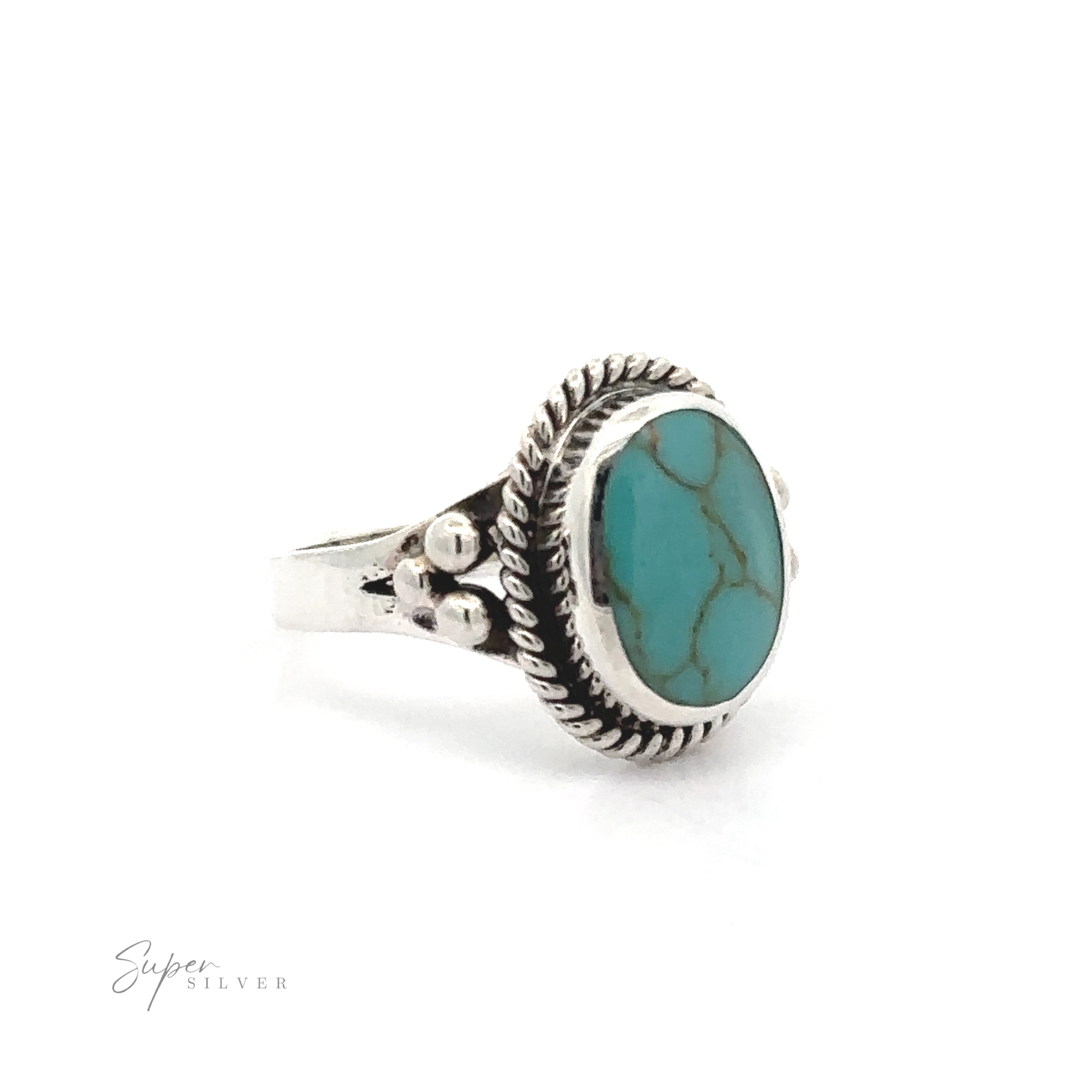 A sterling silver oval ring with a rope setting and inlaid blue stones.